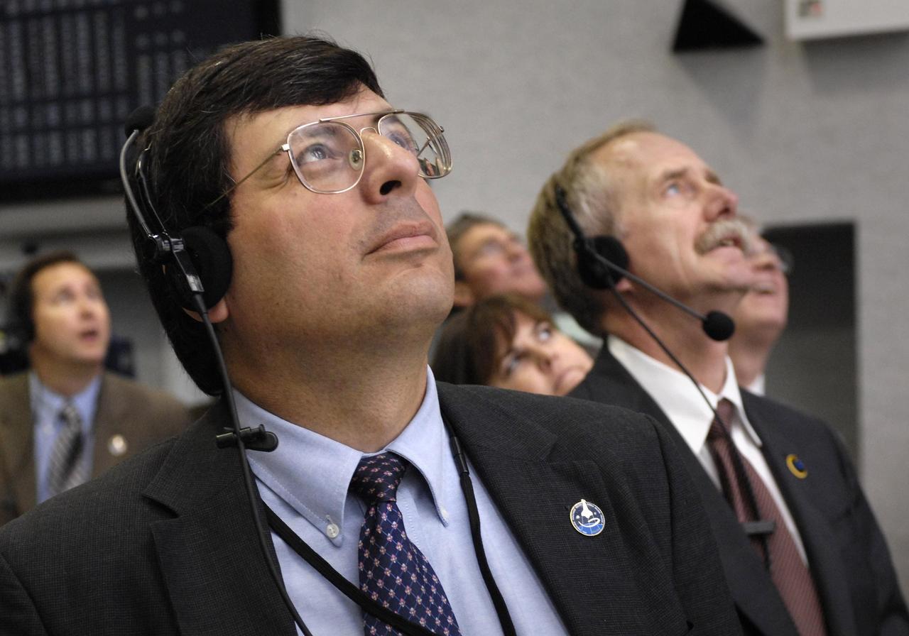 KENNEDY SPACE CENTER, FLA. --  In the firing room at NASA's Kennedy Space Center, NASA Associate Administrator Chris Scolese (left) and associate administrator for NASA Space Operations Bill Gerstenmaier (right) watch the space shuttle Discovery launch on mission STS-120.  Liftoff was on time at 11:38:19 am. EDT.  Discovery carries the Italian-built U.S. Node 2, called Harmony.  During the 14-day STS-120 mission, the crew will install Harmony and move the P6 solar arrays to their permanent position and deploy them. Discovery is expected to complete its mission and return home at 4:47 a.m. EST on Nov. 6. Photo credit: NASA/Bill Ingalls