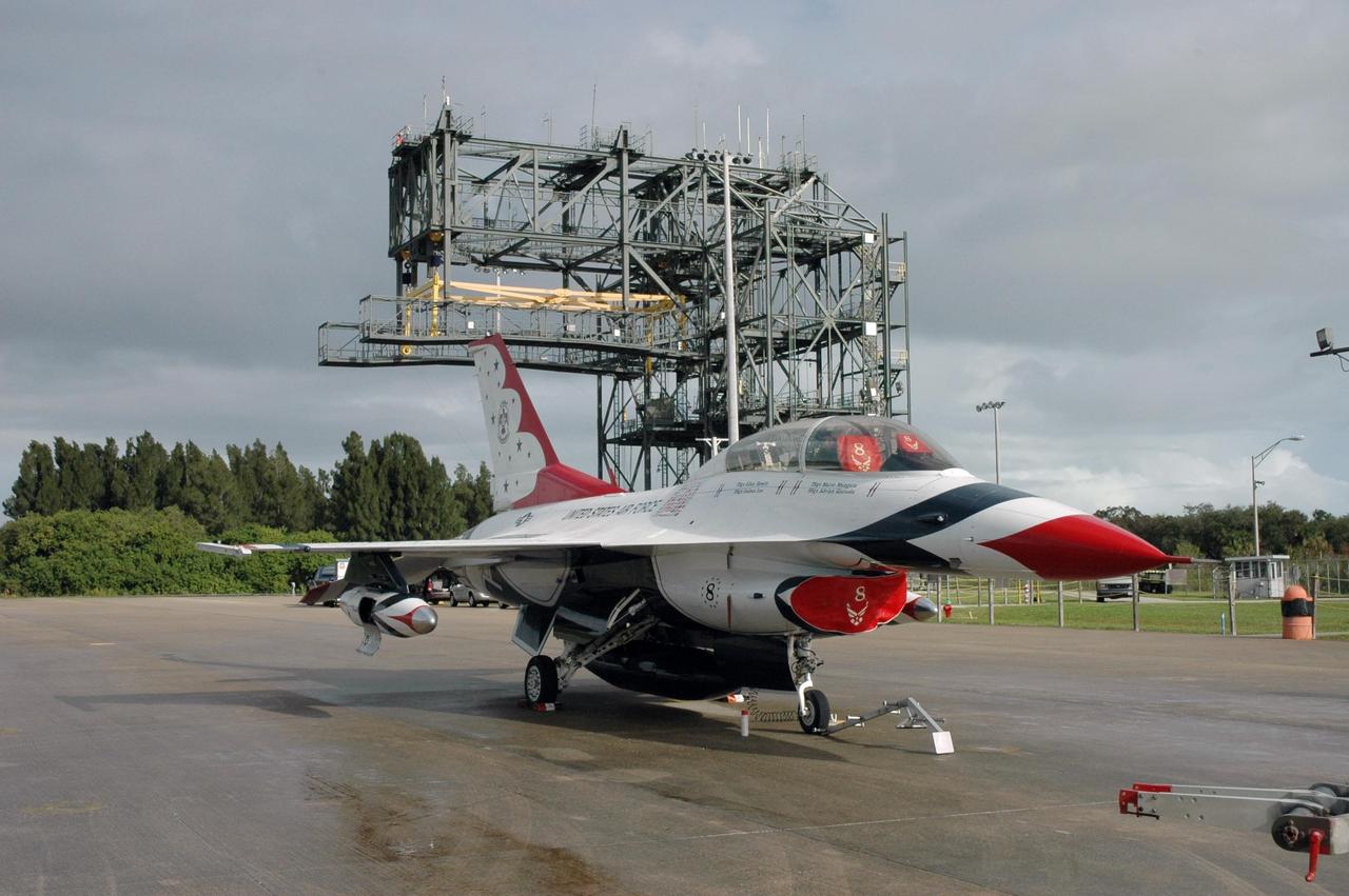 KENNEDY SPACE CENTER, FLA. -- The first of the U.S. Air Force Thunderbirds is parked on the Shuttle Landing Facility at NASA's Kennedy Space Center.  The aerial demonstration squadron is performing for the World Space Expo being held from Nov. 1 to Nov. 4 at the NASA Kennedy Space Center Visitor Complex.  Other aircraft participating in the salute include U.S. Air Force F-22 Raptor, U.S. Navy F-18 Super Hornet, U.S. Air Force F-15 Eagle, the P-51 Mustang Heritage Flight and the U.S. Air Force 920th Rescue Wing, which was responsible for Mercury and Gemini capsule recovery.  The U.S. Army Golden Knights also will demonstrate precision skydiving.  The World Space Expo is an event to commemorate humanity's first 50 years in space while looking forward to returning people to the moon and exploring beyond. The expo will showcase various panels, presentations and educational programs. It also is a part of NASA's 50th anniversary celebrations, highlighting the 45th Anniversary of the Mercury Program celebration featuring original NASA astronauts John Glenn and Scott Carpenter and the Pioneering Women of Aerospace forum featuring Eileen Collins and other prominent female space veterans. The agency was founded Oct. 1, 1958.  Photo credit: NASA/Jack Pfaller