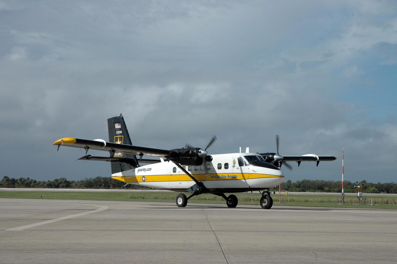 KENNEDY SPACE CENTER, FLA. -- The airplane used by the U.S. Army Golden Knights arrives at the Shuttle Landing Facility at NASA's Kennedy Space Center.  The Golden Knights will demonstrate precision skydiving as part of the World Space Expo being held from Nov. 1 to Nov. 4 at the NASA Kennedy Space Center Visitor Complex.  Other air demonstrations are planned by the U.S. Air Force Thunderbirds Aerial Demonstration Squadron, the U.S. Navy F-18 Super Hornets, U.S. Air Force F-22 Raptor, U.S. Air Force F-15 Eagle, the P-51 Mustang Heritage Flight and the U.S. Air Force 920th Rescue Wing, which was responsible for Mercury and Gemini capsule recovery.  The World Space Expo is an event to commemorate humanity's first 50 years in space while looking forward to returning people to the moon and exploring beyond. The expo will showcase various panels, presentations and educational programs. It also is a part of NASA's 50th anniversary celebrations, highlighting the 45th Anniversary of the Mercury Program celebration featuring original NASA astronauts John Glenn and Scott Carpenter and the Pioneering Women of Aerospace forum featuring Eileen Collins and other prominent female space veterans. The agency was founded Oct. 1, 1958.  Photo credit: NASA/Jack Pfaller