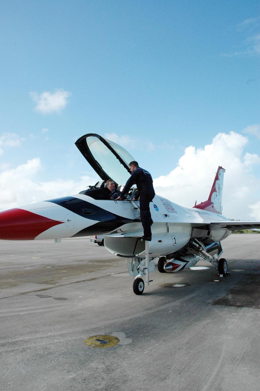 KENNEDY SPACE CENTER, FLA. -- Another of the U.S. Air Force Thunderbirds is parked on the Shuttle Landing Facility at NASA's Kennedy Space Center.  The aerial demonstration squadron is performing for the World Space Expo being held from Nov. 1 to Nov. 4 at the NASA Kennedy Space Center Visitor Complex.  Other aircraft participating in the salute include U.S. Air Force F-22 Raptor, U.S. Navy F-18 Super Hornet, U.S. Air Force F-15 Eagle, the P-51 Mustang Heritage Flight and the U.S. Air Force 920th Rescue Wing, which was responsible for Mercury and Gemini capsule recovery.  The U.S. Army Golden Knights also will demonstrate precision skydiving.  The World Space Expo is an event to commemorate humanity's first 50 years in space while looking forward to returning people to the moon and exploring beyond. The expo will showcase various panels, presentations and educational programs. It also is a part of NASA's 50th anniversary celebrations, highlighting the 45th Anniversary of the Mercury Program celebration featuring original NASA astronauts John Glenn and Scott Carpenter and the Pioneering Women of Aerospace forum featuring Eileen Collins and other prominent female space veterans. The agency was founded Oct. 1, 1958.  Photo credit: NASA/Jack Pfaller