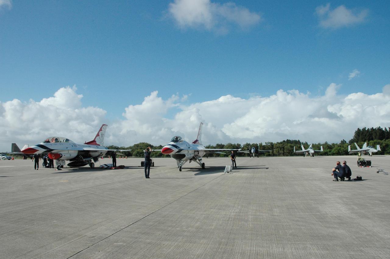 KENNEDY SPACE CENTER, FLA. -- Another of the U.S. Air Force Thunderbirds is parked on the Shuttle Landing Facility at NASA's Kennedy Space Center.  The aerial demonstration squadron is performing for the World Space Expo being held from Nov. 1 to Nov. 4 at the NASA Kennedy Space Center Visitor Complex.  Other aircraft participating in the salute include U.S. Air Force F-22 Raptor, U.S. Navy F-18 Super Hornet, U.S. Air Force F-15 Eagle, the P-51 Mustang Heritage Flight and the U.S. Air Force 920th Rescue Wing, which was responsible for Mercury and Gemini capsule recovery.  The U.S. Army Golden Knights also will demonstrate precision skydiving.  The World Space Expo is an event to commemorate humanity's first 50 years in space while looking forward to returning people to the moon and exploring beyond. The expo will showcase various panels, presentations and educational programs. It also is a part of NASA's 50th anniversary celebrations, highlighting the 45th Anniversary of the Mercury Program celebration featuring original NASA astronauts John Glenn and Scott Carpenter and the Pioneering Women of Aerospace forum featuring Eileen Collins and other prominent female space veterans. The agency was founded Oct. 1, 1958.  Photo credit: NASA/Jack Pfaller