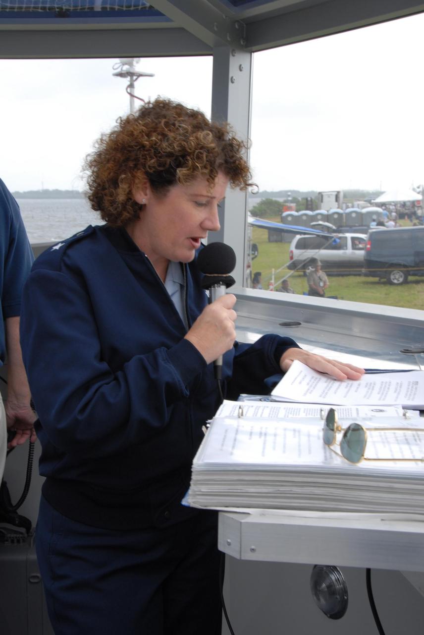 KENNEDY SPACE CENTER, FLA. -- During a rehearsal, Brig. Gen. Susan J. Helms, Commander of the 45th Space Wing at Patrick Air Force Base, makes a few comments to kick off the World Space Expo Aerial Salute at NASA's Kennedy Space Center.  ): Commemorating humanity's first 50 years in space while looking forward to returning people to the moon and exploring beyond, the expo will showcase various panels, presentations and educational programs, as well as the air show.  Participating in the air show are the U.S. Air Force Thunderbirds, U.S. Air Force F-22 Raptor, U.S. Navy F-18 Super Hornet, U.S. Air Force F-15 Eagle, the P-51 Mustang Heritage Flight, and the U.S. Air Force 920th Rescue Wing, which was responsible for Mercury and Gemini capsule recovery. The U.S. Army Golden Knights will also demonstrate precision skydiving. Photo credit: NASA/George Shelton