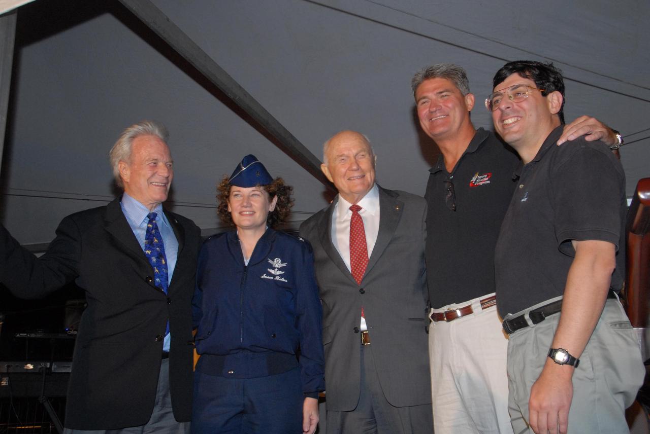 KENNEDY SPACE CENTER, FLA. -- During the World Space Expo held at NASA's Kennedy Space Center Visitor Complex, veteran astronauts pose with current and future VIPs of the Space Program: from left, Mercury astronaut Scott Carpenter; Brig. Gen. Susan  J. Helms, Commander of the 45th Space Wing at Patrick Air Force Base and former shuttle astronaut;  Mercury astronaut John Glenn, who also flew on space shuttle Discovery for STS-95 in 1998; Kennedy Space Center Director Bill Parsons; and NASA Associate Administrator Chris Scolese.  The astronauts were part of the World Space Expo, an event to commemorate humanity's first 50 years in space while looking forward to returning people to the moon and exploring beyond.  The expo showcased various panels, presentations and educational programs, as well as an aerial salute featuring the U.S. Air Force Thunderbirds, U.S. Air Force F-22 Raptor, U.S. Navy F-18 Super Hornet, U.S. Air Force F-15 Eagle, the P-51 Mustang Heritage Flight, and the U.S. Air Force 920th Rescue Wing, which was responsible for Mercury and Gemini capsule recovery. The U.S. Army Golden Knights also demonstrated precision skydiving.  Photo credit: NASA/George Shelton