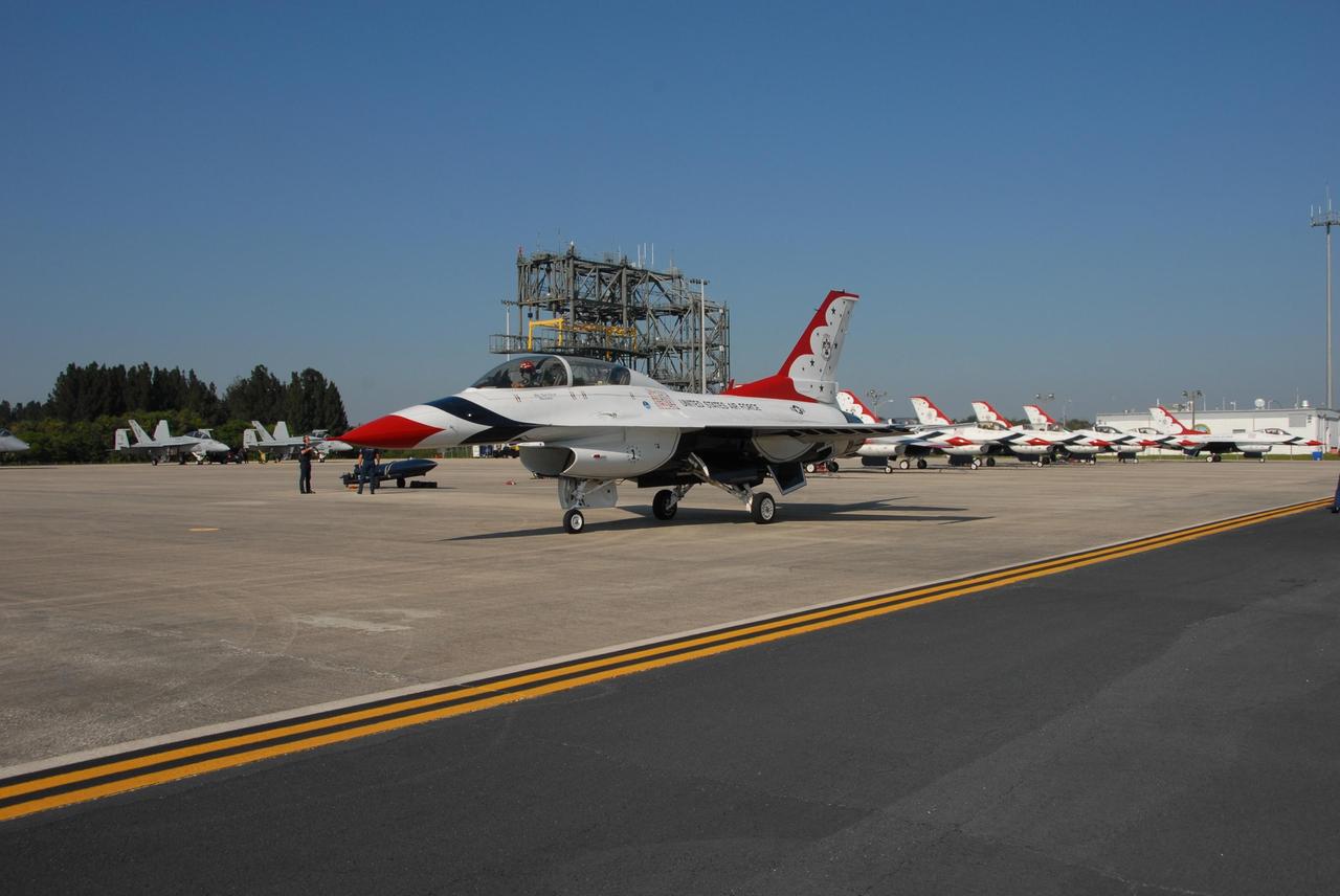 KENNEDY SPACE CENTER, FLA. — At the Shuttle Landing Facility at NASA's Kennedy Space Center, the U.S. Air Force Thunderbirds are ready to take off to participate in an aerial salute for the World Space Expo.  Other aircraft joining in the expo salute include the U.S. Navy F-18 Super Hornets, U.S. Air Force F-22 Raptor,  U.S. Air Force F-15 Eagle, P-51 Mustang Heritage Flight, the U.S. Air Force 920th Rescue Wing, which was responsible for Mercury and Gemini capsule recovery, and the U.S. Army Golden Knights demonstrating precision skydiving.  The World Space Expo Nov. 1-4 was an event commemorating humanity's first 50 years in space while looking forward to returning people to the moon and exploring beyond. The expo showcased various panels, presentations and educational programs. It also was a part of NASA's 50th anniversary celebrations, highlighting the 45th Anniversary of the Mercury Program celebration featuring original NASA astronauts John Glenn and Scott Carpenter and the Pioneering Women of Aerospace forum featuring Eileen Collins and other prominent female space veterans. The agency was founded Oct. 1, 1958.  Photo credit: NASA/George Shelton
