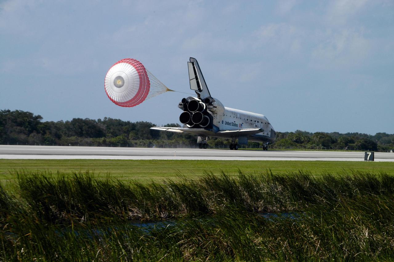 KENNEDY SPACE CENTER, FLA. -- The drag chute deployed behind space shuttle Discovery helps slow its smooth landing on Runway 33 of the Shuttle Landing Facility at NASA's Kennedy Space Center, completing the 15-day mission STS-120.  Main gear touchdown was 1:01:16 p.m.  Wheel stop was at 1:02:07 p.m. Mission elapsed time was 15 days, 2 hours, 24 minutes and 2 seconds. The STS-120 crew continued the construction of the station with the installation of the Harmony Node 2 module and the relocation of the P6 truss. Photo credit: NASA/George Shelton