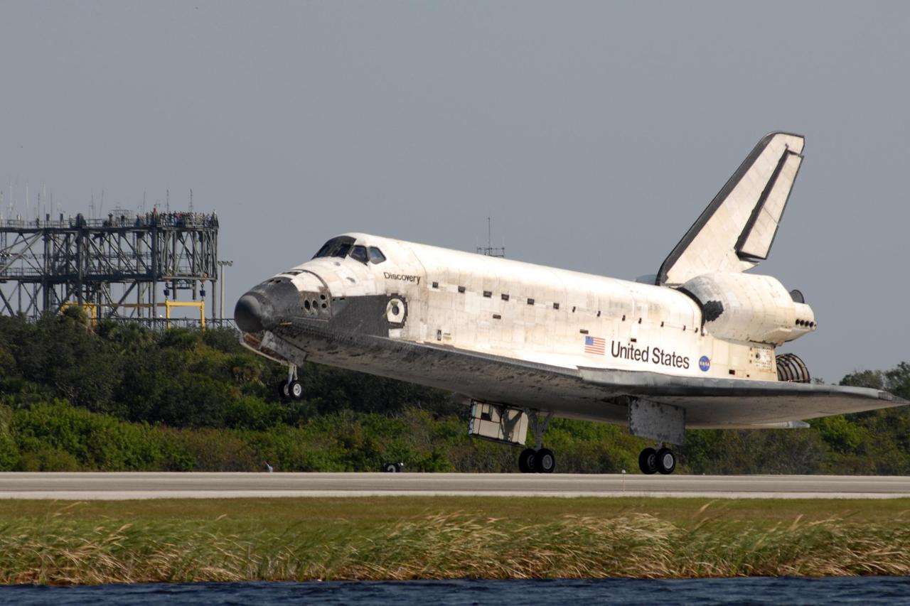 KENNEDY SPACE CENTER, FLA. -- After a 15-day mission to the International Space Station, space shuttle Discovery glides to a smooth landing on Runway 33 of the Shuttle Landing Facility at NASA's Kennedy Space Center at 1:01 p.m. EST on Nov. 7, completing mission STS-120. Main gear touchdown was 1:01:16 p.m. Wheel stop was at 1:02:07 p.m. Mission elapsed time was 15 days, 2 hours, 24 minutes and 2 seconds. The STS-120 crew continued the construction of the station with the installation of the Harmony Node 2 module and the relocation of the P6 truss. Photo credit: NASA/Tom Joseph