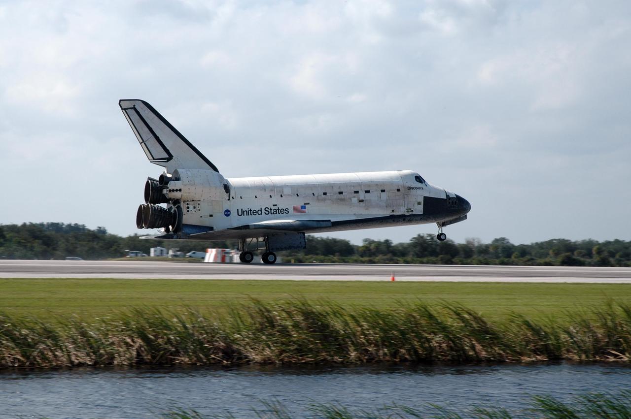 KENNEDY SPACE CENTER, FLA. --  Space shuttle Discovery touches down on Runway 33 of the Shuttle Landing Facility at NASA's Kennedy Space Center, concluding the 15-day mission STS-120.  Commander Pamela Melroy is at the controls, along with Pilot George Zamka.  Main gear touchdown was 1:01:16 p.m.  Wheel stop was at 1:02:07 p.m.  Mission elapsed time was 15 days, 2 hours, 24 minutes and 2 seconds. The STS-120 crew continued the construction of the station with the installation of the Harmony Node 2 module and the relocation of the P6 truss. Photo credit: NASA/Jim Grossmann