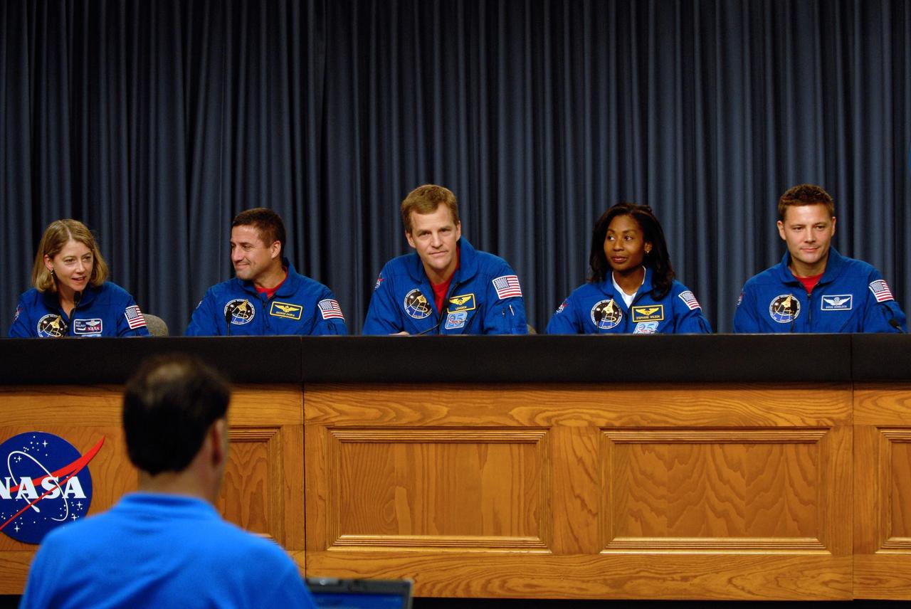 KENNEDY SPACE CENTER, FLA. --   Members of the STS-120 crew take part in a news conference after their successful landing aboard space shuttle Discovery at NASA's Kennedy Space Center.  From left are Commander Pamela Melroy, Pilot George Zamka and mission specialists Scott Parazynski, Stephanie Wilson and Doug Wheelock.  The crew completed a 15-day mission to the International Space Station with a smooth landing on Runway 33.  Main gear touchdown was 1:01:16 p.m.  Wheel stop was at 1:02:07 p.m.  Mission elapsed time was 15 days, 2 hours, 24 minutes and 2 seconds.  Mission STS-120 continued the construction of the station with the installation of the Harmony Node 2 module and the relocation of the P6 truss. Photo credit: NASA/Kim Shiflett