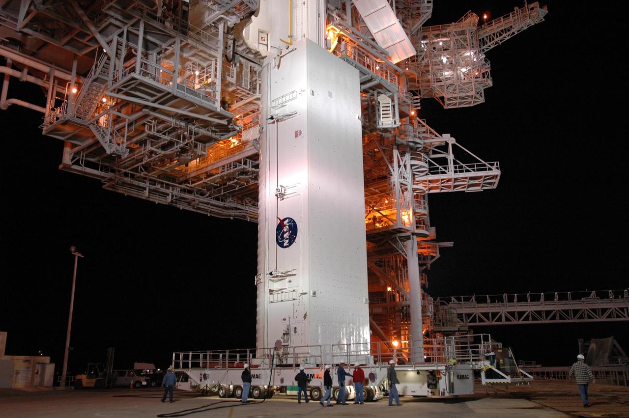 KENNEDY SPACE CENTER, FLA. -- On Launch Pad 39A at NASA's Kennedy Space Center, the payload canister is positioned under the payload changeout room, on the rotating service structure.   The canister contains the Columbus Lab module and integrated cargo carrier-lite payloads for space shuttle Atlantis on mission STS-122.  They will be transferred into the payload changeout room on the pad. Atlantis is targeted to launch on Dec. 6.  Photo credit: NASA/Dimitri Gerondidakis