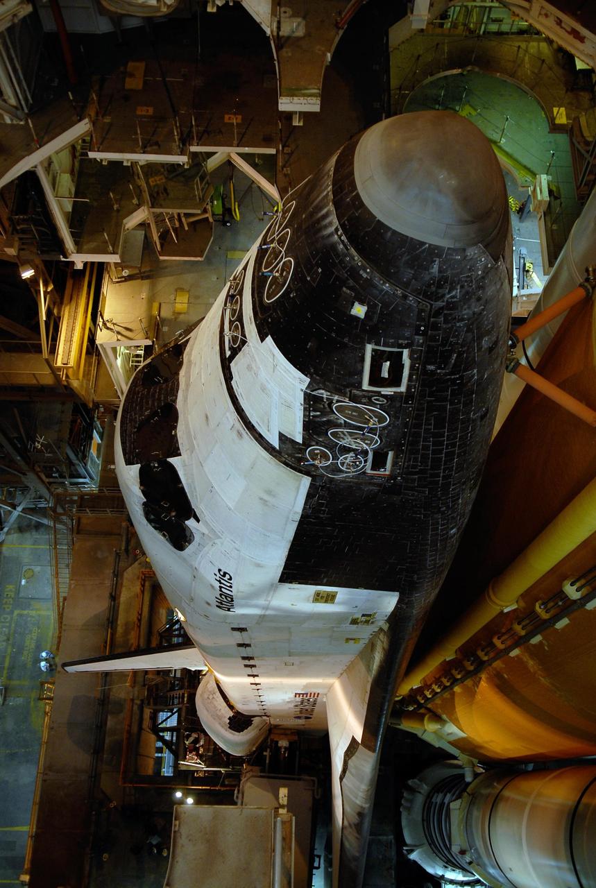 KENNEDY SPACE CENTER, FLA. -- Seen from above, Space Shuttle Atlantis is ready to move through the doors of the Vehicle Assembly Building toward Launch Pad 39A. First motion out of the VAB was at 4:43 a.m. EST. Rollout is a milestone for Atlantis' launch to the International Space Station on mission STS-122, targeted for Dec. 6. On this mission, Atlantis will deliver the Columbus module to the International Space Station. The European Space Agency's largest contribution to the station, Columbus is a multifunctional, pressurized laboratory that will be permanently attached to U.S. Node 2, called Harmony. The module is approximately 23 feet long and 15 feet wide, allowing it to hold 10 large racks of experiments. The laboratory will expand the research facilities aboard the station, providing crew members and scientists from around the world the ability to conduct a variety of experiments in the physical, materials and life sciences. Photo credit: NASA/Kim Shiflett