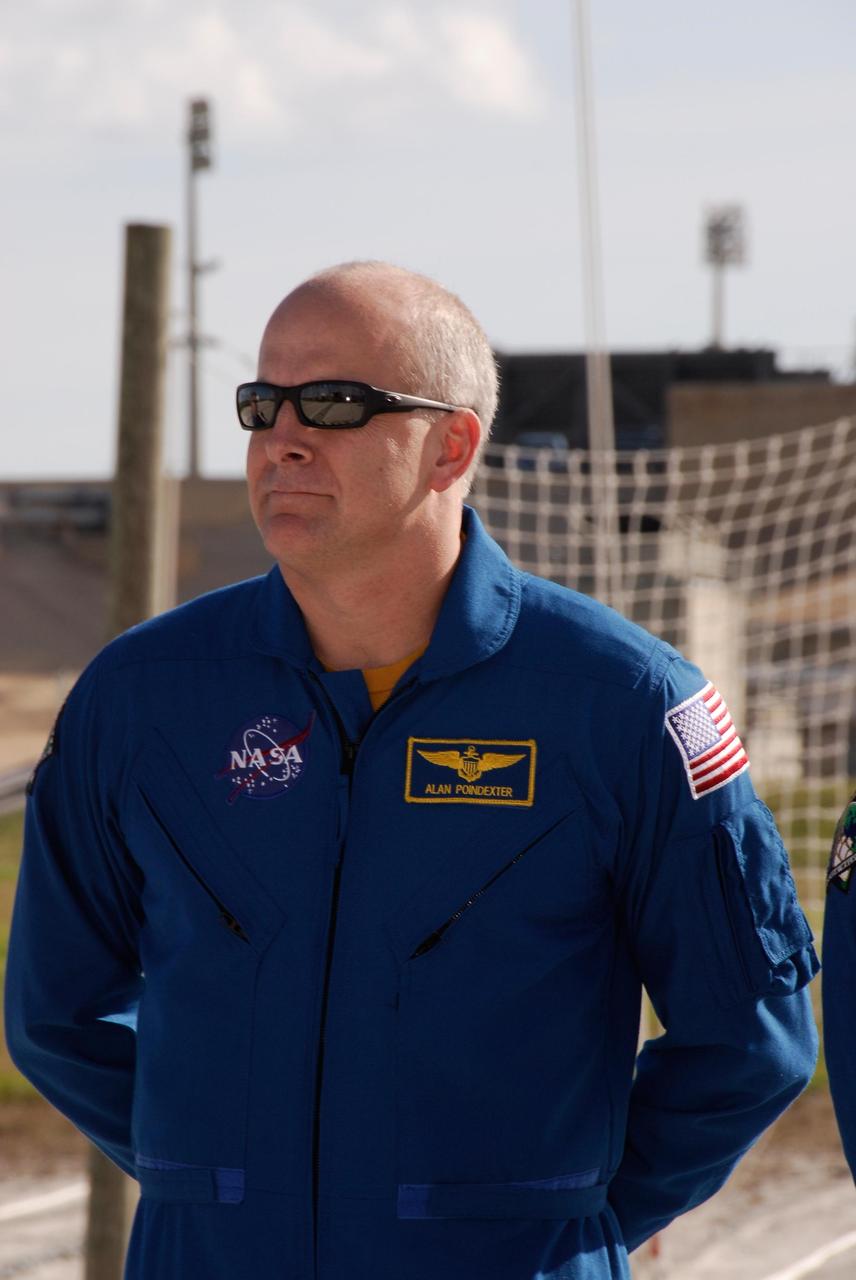 KENNEDY SPACE CENTER, FLA. --  Space shuttle Atlantis STS-122 Pilot Alan Poindexter takes part in a press conference at the slidewire basket landing on Launch Pad 39A.  The STS-122 crew is at NASA's Kennedy Space Center to take part in terminal countdown demonstration test, or TCDT, activities, a standard part of launch preparations. The TCDT provides astronauts and ground crews with equipment familiarization, emergency egress training and a simulated launch countdown. On mission STS-122, Atlantis will deliver the European Space Agency's Columbus module to the International Space Station.  Columbus is a multifunctional, pressurized laboratory that will be permanently attached to U.S. Node 2, called Harmony, and will expand the research facilities aboard the station. Launch is targeted for Dec. 6.  Photo credit: NASA/Kim Shiflett