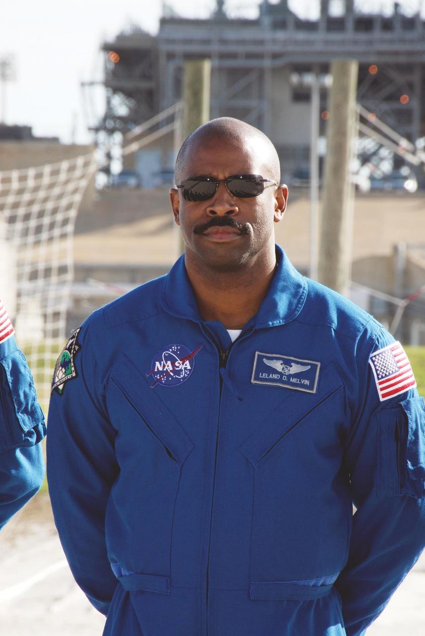 KENNEDY SPACE CENTER, FLA. --  Space shuttle Atlantis STS-122 Mission Specialist Leland Melvin takes part in a press conference at the slidewire basket landing on Launch Pad 39A.  The STS-122 crew is at NASA's Kennedy Space Center to take part in terminal countdown demonstration test, or TCDT, activities, a standard part of launch preparations. The TCDT provides astronauts and ground crews with equipment familiarization, emergency egress training and a simulated launch countdown. On mission STS-122, Atlantis will deliver the European Space Agency's Columbus module to the International Space Station.  Columbus is a multifunctional, pressurized laboratory that will be permanently attached to U.S. Node 2, called Harmony, and will expand the research facilities aboard the station. Launch is targeted for Dec. 6.  Photo credit: NASA/Kim Shiflett