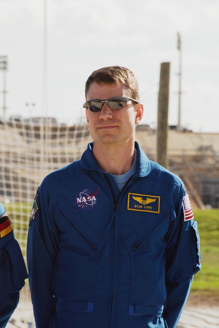 KENNEDY SPACE CENTER, FLA. --  Space shuttle Atlantis STS-122 Mission Specialist Stanley Love takes part in a press conference at the slidewire basket landing on Launch Pad 39A.  The STS-122 crew is at NASA's Kennedy Space Center to take part in terminal countdown demonstration test, or TCDT, activities, a standard part of launch preparations. The TCDT provides astronauts and ground crews with equipment familiarization, emergency egress training and a simulated launch countdown. On mission STS-122, Atlantis will deliver the European Space Agency's Columbus module to the International Space Station.  Columbus is a multifunctional, pressurized laboratory that will be permanently attached to U.S. Node 2, called Harmony, and will expand the research facilities aboard the station. Launch is targeted for Dec. 6.  Photo credit: NASA/Kim Shiflett