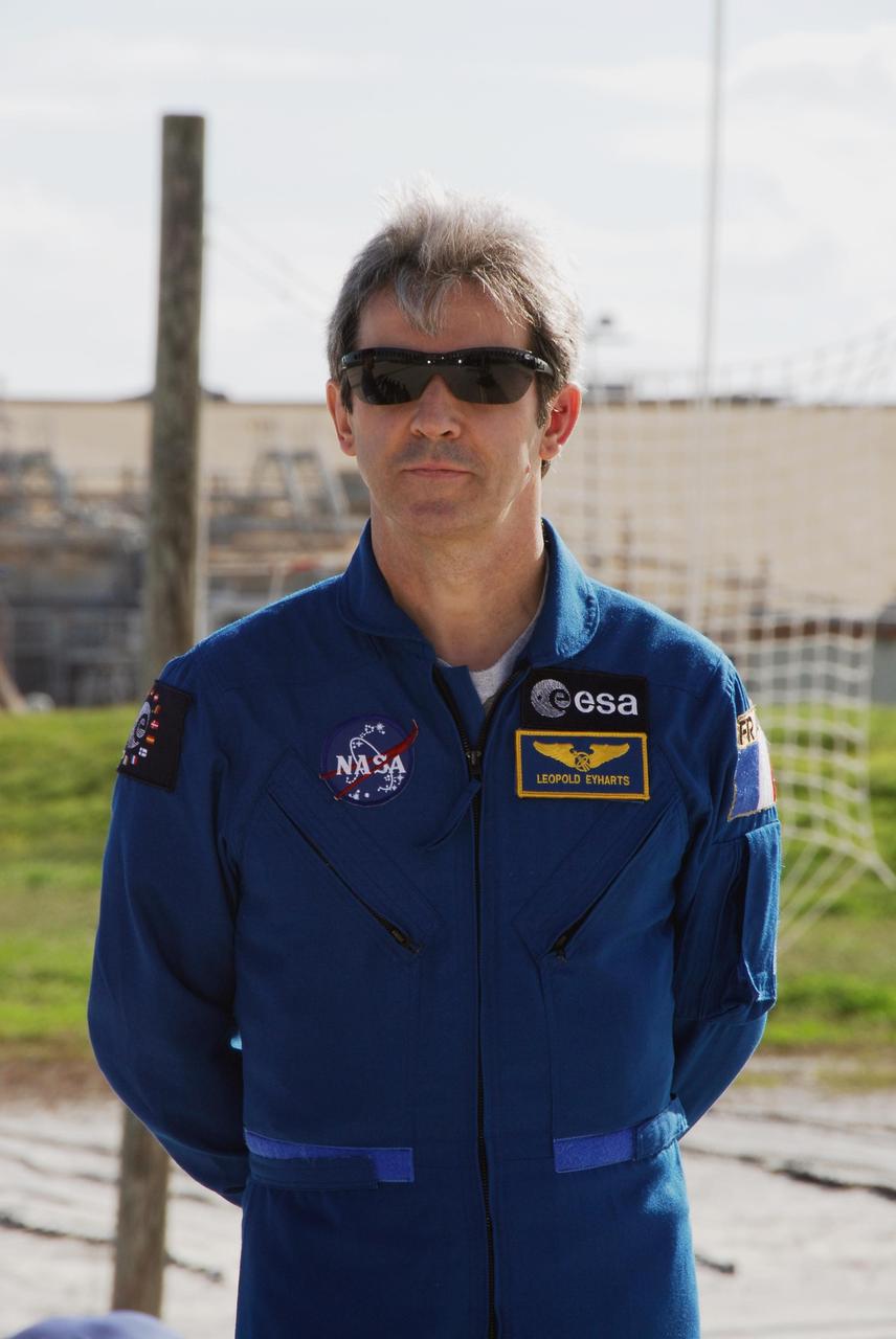 KENNEDY SPACE CENTER, FLA. --  Space shuttle Atlantis STS-122 Mission Specialist Leopold Eyharts takes part in a press conference at the slidewire basket landing on Launch Pad 39A.  Eyharts is with the European Space Agency and will remain on the International Space Station as a flight engineer for Expedition 16 following the STS-122 mission.  The STS-122 crew is at NASA's Kennedy Space Center to take part in terminal countdown demonstration test, or TCDT, activities, a standard part of launch preparations. The TCDT provides astronauts and ground crews with equipment familiarization, emergency egress training and a simulated launch countdown. On mission STS-122, Atlantis will deliver the European Space Agency's Columbus module to the International Space Station.  Columbus is a multifunctional, pressurized laboratory that will be permanently attached to U.S. Node 2, called Harmony, and will expand the research facilities aboard the station. Launch is targeted for Dec. 6.  Photo credit: NASA/Kim Shiflett