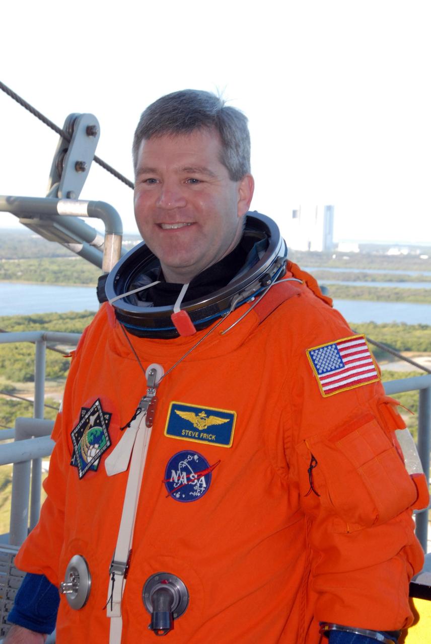 KENNEDY SPACE CENTER, FLA. --  Space shuttle Atlantis STS-122 Commander Steve Frick arrives at Launch Pad 39A, dressed in his launch and entry suit, to participate in a simulated launch countdown aboard Atlantis.   The exercise is part of terminal countdown demonstration test, or TCDT, activities at NASA's Kennedy Space Center. The TCDT is a dress rehearsal for launch and also provides astronauts and ground crews with equipment familiarization and emergency egress training.  On mission STS-122, Atlantis will deliver the Columbus module to the International Space Station. The European Space Agency's largest single contribution to the station, Columbus is a multifunctional, pressurized laboratory that will be permanently attached to U.S. Node 2, called Harmony. The laboratory will expand the research facilities aboard the station, providing crew members and scientists from around the world the ability to conduct a variety of experiments in the physical, materials and life sciences. Atlantis' launch is targeted for Dec. 6.  Photo credit: NASA/George Shelton