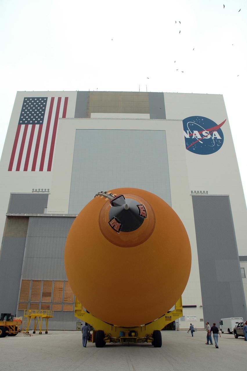 KENNEDY SPACE CENTER, FLA. -- The external tank for space shuttle Endeavour's STS-123 mission heads for the opening in the Vehicle Assembly Building. The tank was shipped from NASA's Michoud Assembly Facility near New Orleans aboard the Pegasus barge. Endeavour is targeted for launch to the International Space Station on Feb. 14. Photo credit: NASA/Jim Grossmann
