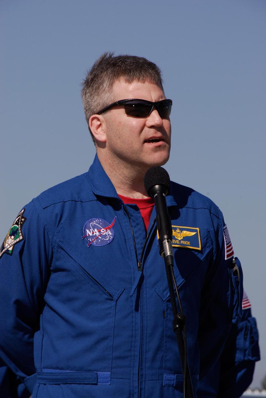 KENNEDY SPACE CENTER, FLA. --  After arrival at NASA's Kennedy Space Center, STS-122 Commander Steve Frick talks to the media on the Shuttle Landing Facility. The crew's arrival signals the imminent launch of space shuttle Atlantis on mission STS-122.  The launch countdown begins at 7 p.m. Dec. 3.  Launch is scheduled for 4:31 p.m. EST on Dec. 6.  Atlantis will carry the Columbus Lab, Europe's largest contribution to the construction of the International Space Station. It will support scientific and technological research in a microgravity environment. Columbus, a program of ESA, is a multifunctional, pressurized laboratory that will be permanently attached to Node 2 of the space station to carry out experiments in materials science, fluid physics and biosciences, as well as to perform a number of technological applications.  Photo credit: NASA/Kim Shiflett