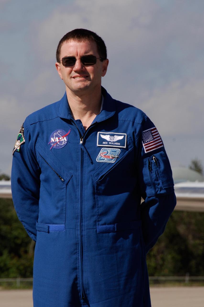 KENNEDY SPACE CENTER, FLA. --  After the mission STS-122 crew's arrival at NASA's Kennedy Space Center, Mission Specialist Rex Walheim is introduced during a media  opportunity on the Shuttle Landing Facility.  The crew's arrival signals the imminent launch of space shuttle Atlantis on mission STS-122.  The launch countdown begins at 7 p.m. Dec. 3.  Launch is scheduled for 4:31 p.m. EST on Dec. 6.  Atlantis will carry the Columbus Lab, Europe's largest contribution to the construction of the International Space Station. It will support scientific and technological research in a microgravity environment. Columbus, a program of ESA, is a multifunctional, pressurized laboratory that will be permanently attached to Node 2 of the space station to carry out experiments in materials science, fluid physics and biosciences, as well as to perform a number of technological applications.  Photo credit: NASA/Kim Shiflett