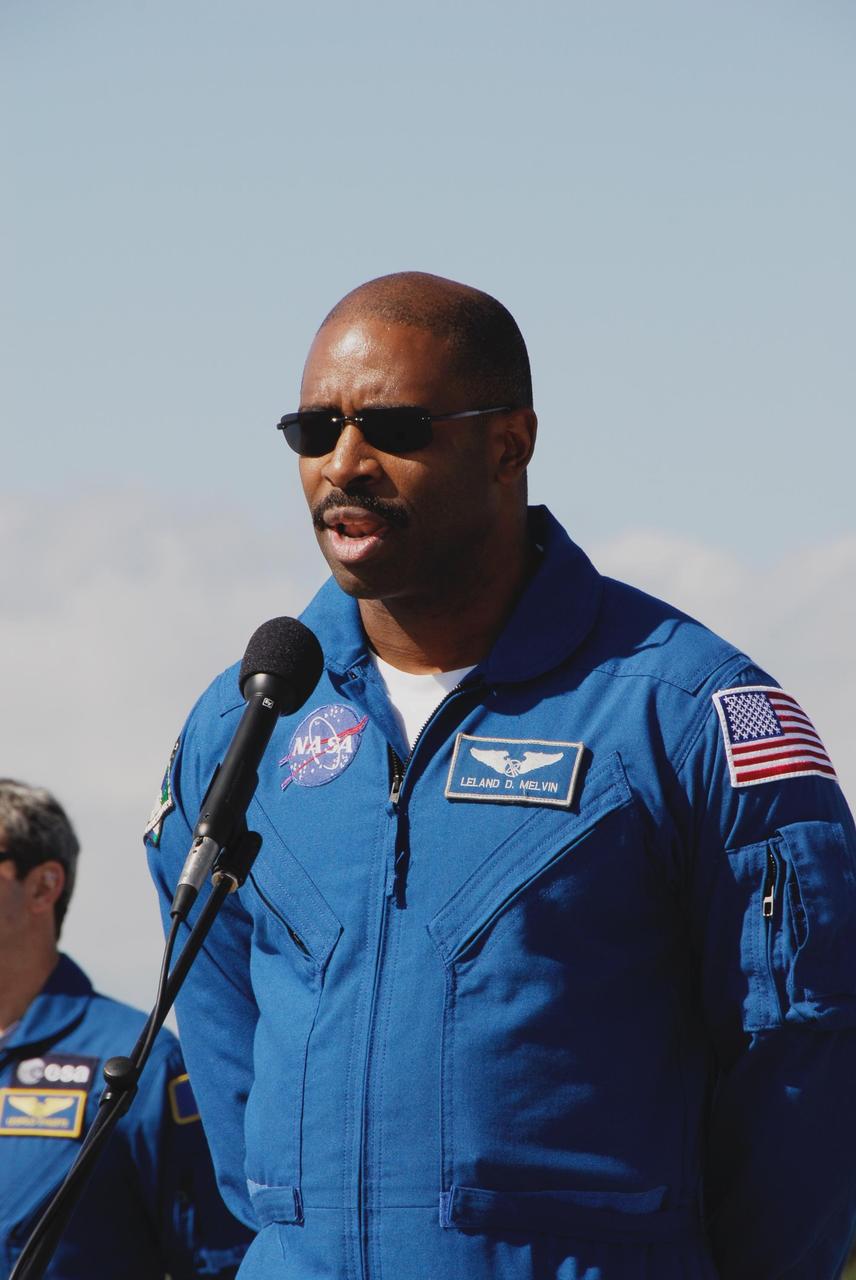 KENNEDY SPACE CENTER, FLA. --  After the mission STS-122 crew's arrival at NASA's Kennedy Space Center, Mission Specialist Leland Melvin is introduced during a media opportunity on the Shuttle Landing Facility. The crew's arrival signals the imminent launch of space shuttle Atlantis on mission STS-122.  The launch countdown begins at 7 p.m. Dec. 3.  Launch is scheduled for 4:31 p.m. EST on Dec. 6.  Atlantis will carry the Columbus Lab, Europe's largest contribution to the construction of the International Space Station. It will support scientific and technological research in a microgravity environment. Columbus, a program of ESA, is a multifunctional, pressurized laboratory that will be permanently attached to Node 2 of the space station to carry out experiments in materials science, fluid physics and biosciences, as well as to perform a number of technological applications.  Photo credit: NASA/Kim Shiflett