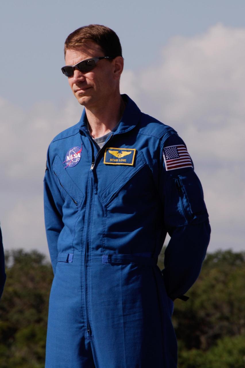 KENNEDY SPACE CENTER, FLA. --  After the mission STS-122 crew's arrival at NASA's Kennedy Space Center, Mission Specialist Stanley Love is introduced during a media  opportunity on the Shuttle Landing Facility. The crew's arrival signals the imminent launch of space shuttle Atlantis on mission STS-122.  The launch countdown begins at 7 p.m. Dec. 3.  Launch is scheduled for 4:31 p.m. EST on Dec. 6.  Atlantis will carry the Columbus Lab, Europe's largest contribution to the construction of the International Space Station. It will support scientific and technological research in a microgravity environment. Columbus, a program of ESA, is a multifunctional, pressurized laboratory that will be permanently attached to Node 2 of the space station to carry out experiments in materials science, fluid physics and biosciences, as well as to perform a number of technological applications.  Photo credit: NASA/Kim Shiflett