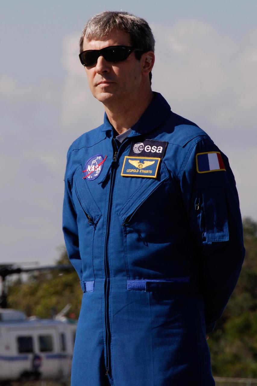 KENNEDY SPACE CENTER, FLA. --  After the mission STS-122 crew's arrival at NASA's Kennedy Space Center, Mission Specialist Leopold Eyharts is introduced during a media  opportunity on the Shuttle Landing Facility.  Eyharts, who represents the European Space Agency, will remain on the International Space Station while Atlantis returns flight engineer Daniel Tani. The crew's arrival signals the imminent launch of space shuttle Atlantis on mission STS-122.  The launch countdown begins at 7 p.m. Dec. 3.  Launch is scheduled for 4:31 p.m. EST on Dec. 6.  Endeavour will carry the Columbus Lab, Europe's largest contribution to the construction of the International Space Station. It will support scientific and technological research in a microgravity environment. Columbus, a program of ESA, is a multifunctional, pressurized laboratory that will be permanently attached to Node 2 of the space station to carry out experiments in materials science, fluid physics and biosciences, as well as to perform a number of technological applications.  Photo credit: NASA/Kim Shiflett