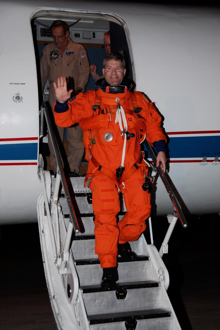 KENNEDY SPACE CENTER, FLA. --  STS-122 Commander Steve Frick seems satisfied with the landing practice session he has just completed aboard a shuttle training aircraft, or STA, at Kennedy Space Center's Shuttle Landing Facility.  Frick and Pilot Alan Poindexter are preparing for the Dec. 6 launch on space shuttle Atlantis.  The STA is a Grumman American Aviation-built Gulf Stream II jet that was modified to simulate an orbiter's cockpit, motion and visual cues, and handling qualities.  Photo credit: NASA/Kim Shiflett