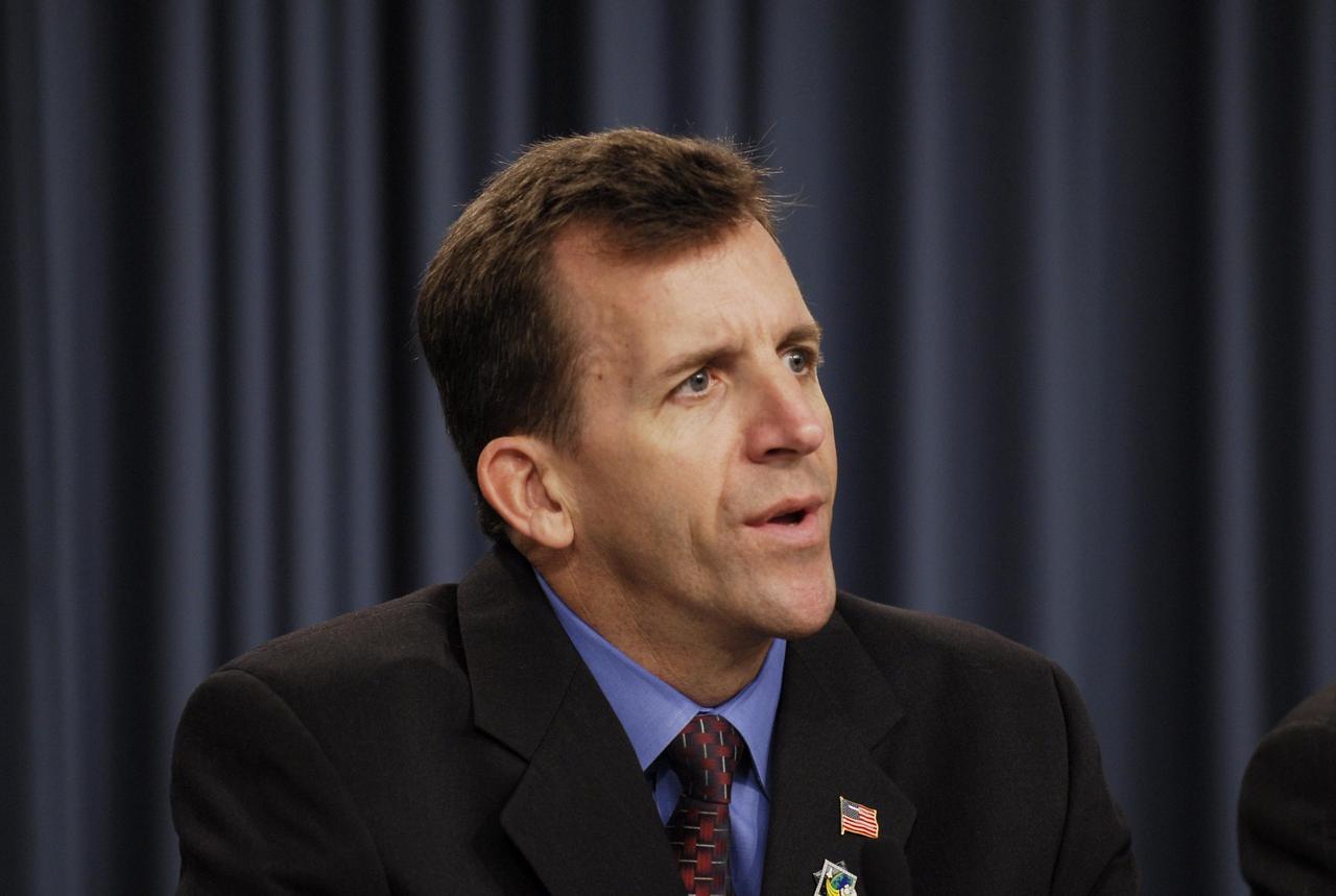 KENNEDY SPACE CENTER, FLA. --  LeRoy Cain, the Mission Management Team chairman, participates in a news briefing following the conclusion of a team meeting. The meeting followed the morning's launch scrub caused by problems experienced with the space shuttle Atlantis STS-122 external tank's engine cutoff sensor system during tanking for the second launch attempt.  An announcement was made during the briefing that the STS-122 launch is postponed to no earlier than Jan. 2, 2008, to give the team time to resolve the system's problems.  Atlantis will carry the Columbus Laboratory, the European Space Agency's largest contribution to the construction of the International Space Station. It will support scientific and technological research in a microgravity environment.  Permanently attached to the Harmony node of the space station, the laboratory will carry out experiments in materials science, fluid physics and biosciences, as well as perform a number of technological applications.  Photo credit: NASA/Kim Shiflett