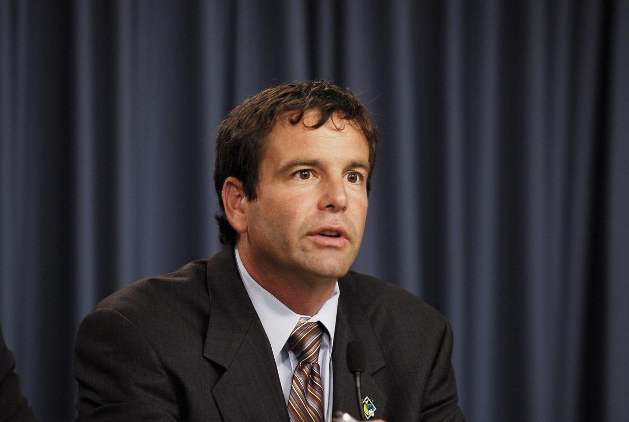 KENNEDY SPACE CENTER, FLA. -- Doug Lyons, STS-122 launch director, participates in a news briefing following the conclusion of a Mission Management Team, or MMT, meeting. The meeting followed the morning's launch scrub of the space shuttle Atlantis STS-122 mission caused by problems experienced with the external tank's engine cutoff sensor system during tanking for the second launch attempt. An announcement was made during the briefing that the STS-122 launch is postponed to no earlier than Jan. 2, 2008, to give the team time to resolve the system's problems. Atlantis will carry the Columbus Laboratory, the European Space Agency's largest contribution to the construction of the International Space Station. It will support scientific and technological research in a microgravity environment. Permanently attached to the Harmony node of the space station, the laboratory will carry out experiments in materials science, fluid physics and biosciences, as well as perform a number of technological applications. Photo credit: NASA/Kim Shiflett