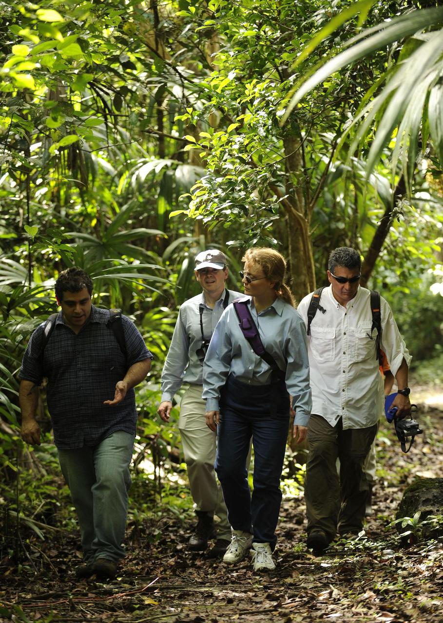 PETEN, GUATEMALA --  (From left) NASA Research Scientist Dr. William Saturno, Program Manager for NASA Earth Science Division Woody Turner, NASA's Deputy Administrator Shana Dale and NASA Deputy Assistant Administrator for External Relations Al Condes investigate the San Bartolo Maya archaeological site in Peten, Guatemala, on Dec. 11.  NASA's remote sensing data were used to locate and interpret the remains of the ancient Maya civilization.  Photo credit:  NASA/Bill Ingalls