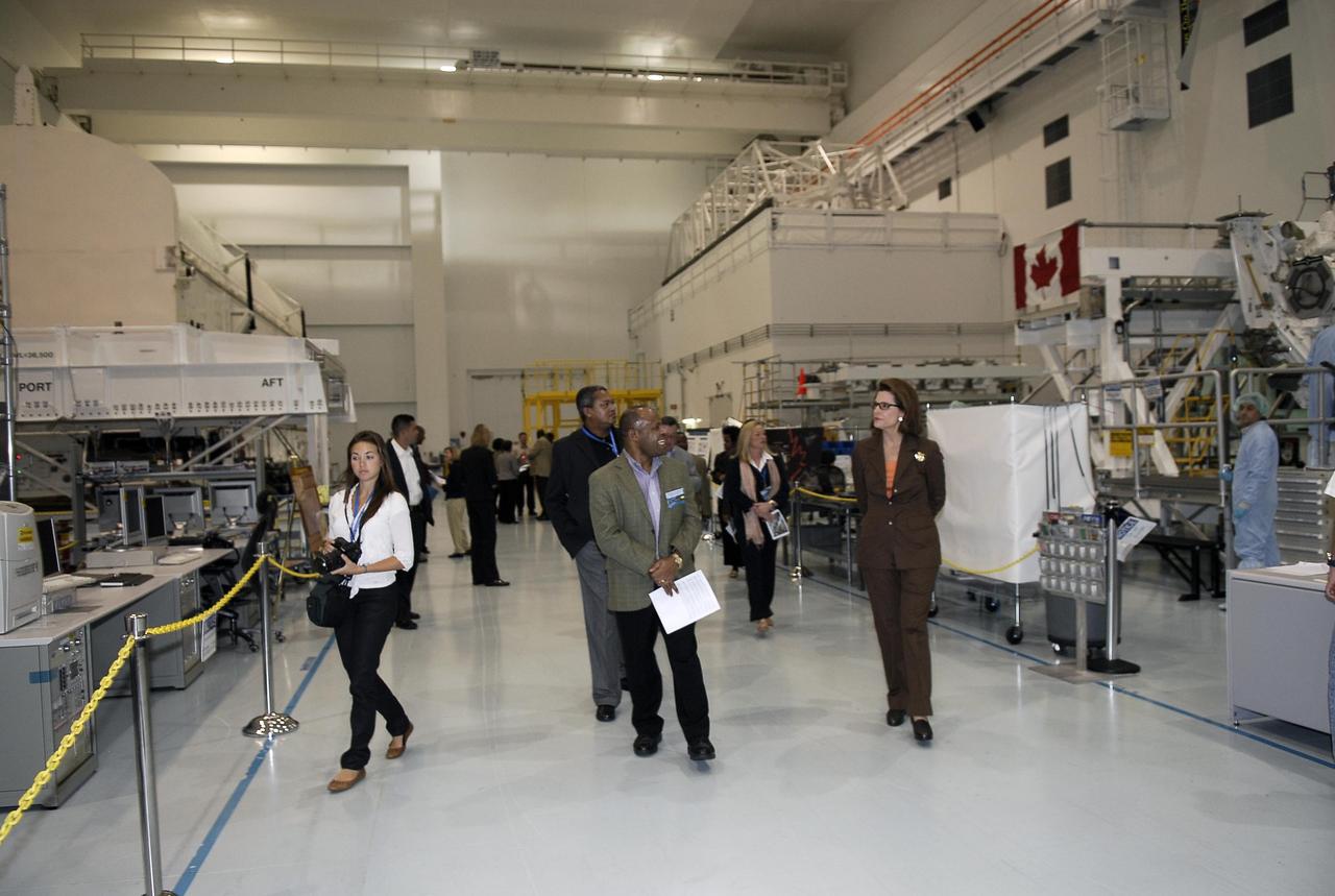 KENNEDY SPACE CENTER, FLA. -- A group of The Chiefs of Diplomatic Missions from more than 45 countries tour the Space Station Processing Facility, looking over the various elements intended to be flown to the space station.  The visit, one of the largest tours undertaken by the diplomatic corps, is part of the State Department's new Experience America program. The international dignitaries were provided an overview of the United States' space exploration programs and NASA's international cooperation in pursuit of exploration and scientific discovery. They visited various locations at Kennedy, including the Space Station Processing Facility and Launch Pad 39A where space shuttle Atlantis is being prepared for its upcoming mission to the International Space Station.   Photo credit: NASA/Kim Shiflett