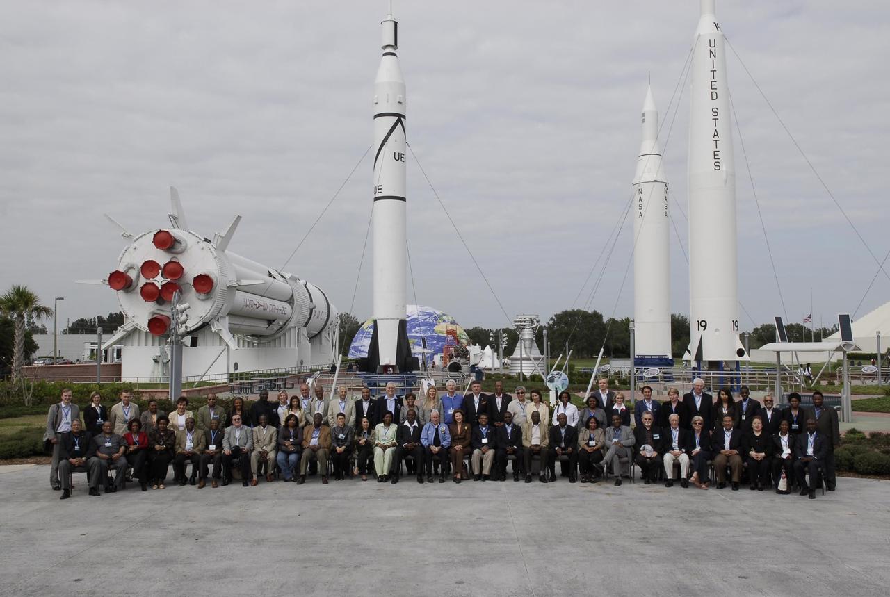 KENNEDY SPACE CENTER, FLA. -- The Chiefs of Diplomatic Missions from more than 45 countries gather in the Rocket Garden at NASA's Kennedy Space Center Visitor Complex.  The visit, one of the largest tours undertaken by the diplomatic corps, is part of the State Department's new Experience America program. The international dignitaries were provided an overview of the United States' space exploration programs and NASA's international cooperation in pursuit of exploration and scientific discovery. They visited various locations at Kennedy, including the Space Station Processing Facility and Launch Pad 39A where space shuttle Atlantis is being prepared for its upcoming mission to the International Space Station.   Photo credit: NASA/Kim Shiflett