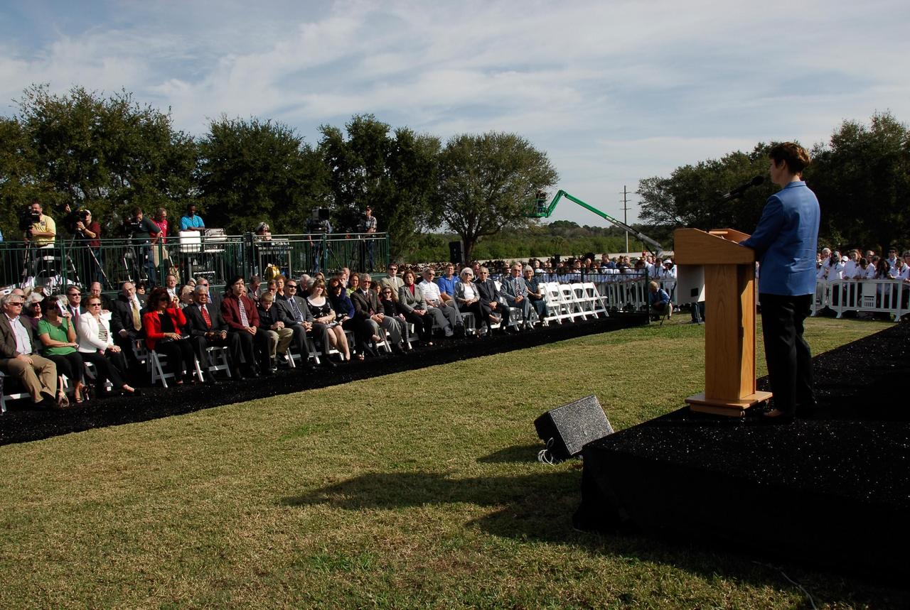 KENNEDY SPACE CENTER, FLA. -- In a special commemorative service held at NASA's Kennedy Space Center Visitor Complex to honor NASA's fallen heroes, astronaut Eileen Collins speaks to guests gathered at the Space Mirror Memorial.  Collins commanded the first shuttle mission following the Columbia accident, STS-114.  Kennedy marked the NASA Day of Remembrance with special ceremonies.  This year the crew of Columbia was remembered in a special way on the day that marked the fifth anniversary of the Columbia accident.   Photo credit: NASA/Kim Shiflett