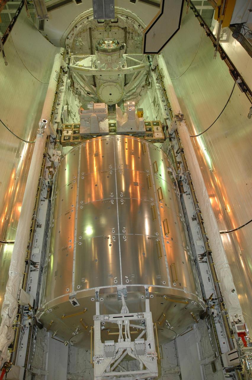 KENNEDY SPACE CENTER, FLA. -- With the Columbus Laboratory secure in space shuttle Atlantis' payload bay on Launch Pad 39A at NASA's Kennedy Space Center, the bay doors are ready for closure.  Located above the laboratory are the integrated cargo carrier - lite and the orbital docking system (at top).   STS-122 is the 121st space shuttle flight, the 29th flight for Atlantis and the 24th flight to the International Space Station. The Columbus laboratory module, built by the European Space Agency, is approximately 23 feet long and 15 feet wide, allowing it to hold 10 large racks of experiments. Atlantis is scheduled to launch at 2:45 p.m. Feb. 7.  Photo credit: NASA/Jack Pfaller