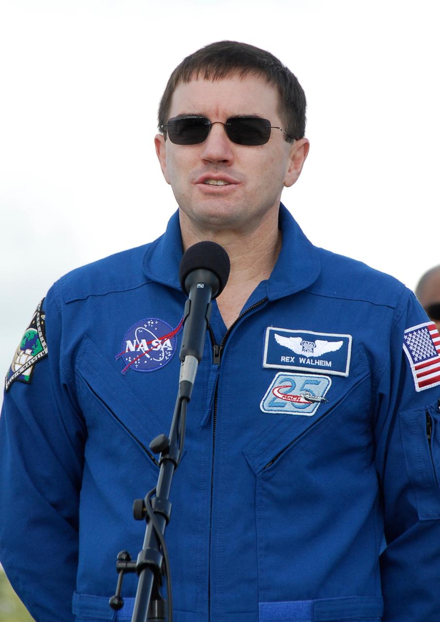 KENNEDY SPACE CENTER, FLA. -- After his arrival at NASA's Kennedy Space Center, STS-122 Mission Specialist Rex Walheim tells the media he is ready for flight. The crew's arrival signals the imminent launch of space shuttle Atlantis' STS-122 mission, at 2:45 p.m. Feb. 7. This will be the third launch attempt for the mission. Some of the tank's ECO sensors gave failed readings during propellant tanking for launch attempts on Dec. 6 and Dec. 9, subsequently scrubbing further attempts until the cause could be found and repairs made. Atlantis will carry the Columbus module, Europe's largest contribution to the construction of the International Space Station. It will support scientific and technological research in a microgravity environment. Columbus is a multifunctional, pressurized laboratory that will be permanently attached to the Harmony module of the space station to carry out experiments in materials science, fluid physics and biosciences, as well as to perform a number of technological applications. Photo credit: NASA/Kim Shiflett