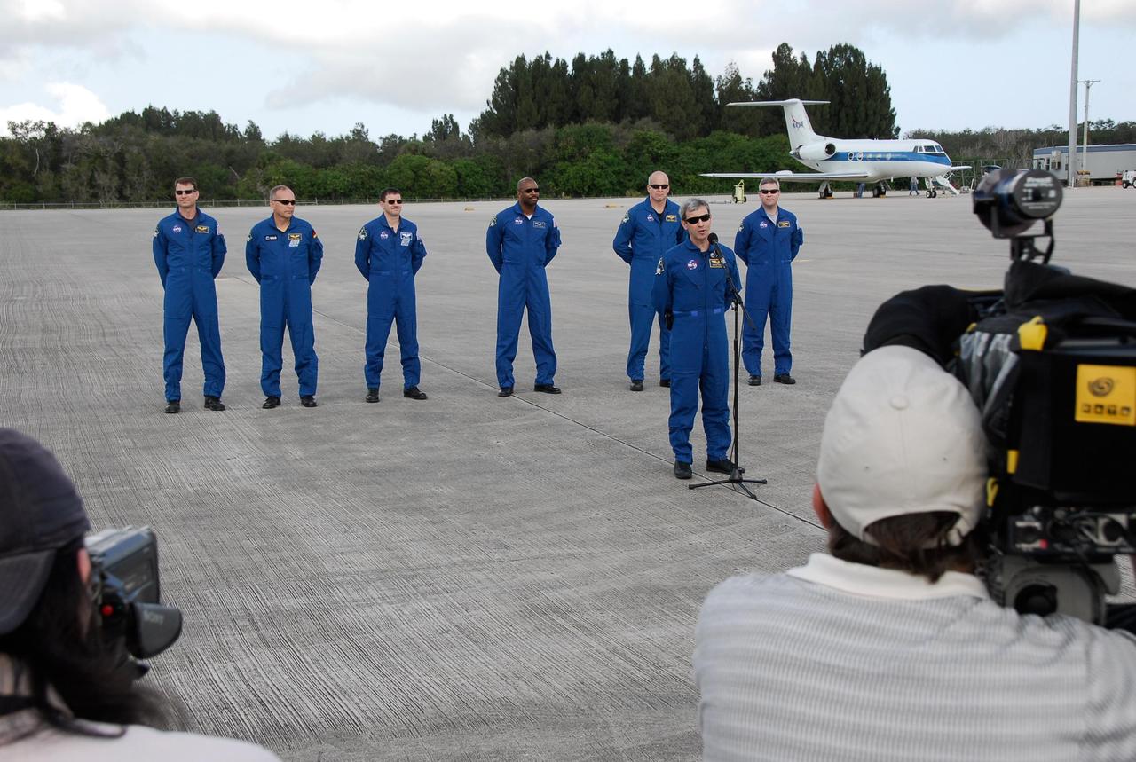 KENNEDY SPACE CENTER, FLA. -- After his arrival at NASA's Kennedy Space Center, STS-122 Mission Specialist Leopold Eyharts, who represents the European Space Agency, tells the media he is happy to be back to try again to launch Columbus on space shuttle Atlantis. The crew's arrival signals the imminent launch of space shuttle Atlantis' STS-122 mission, at 2:45 p.m. Feb. 7. This will be the third launch attempt for the mission. Some of the tank's ECO sensors gave failed readings during propellant tanking for launch attempts on Dec. 6 and Dec. 9, subsequently scrubbing further attempts until the cause could be found and repairs made. Atlantis will carry the Columbus module, Europe's largest contribution to the construction of the International Space Station. It will support scientific and technological research in a microgravity environment. Columbus is a multifunctional, pressurized laboratory that will be permanently attached to the Harmony module of the space station to carry out experiments in materials science, fluid physics and biosciences, as well as to perform a number of technological applications. Photo credit: NASA/Kim Shiflett
