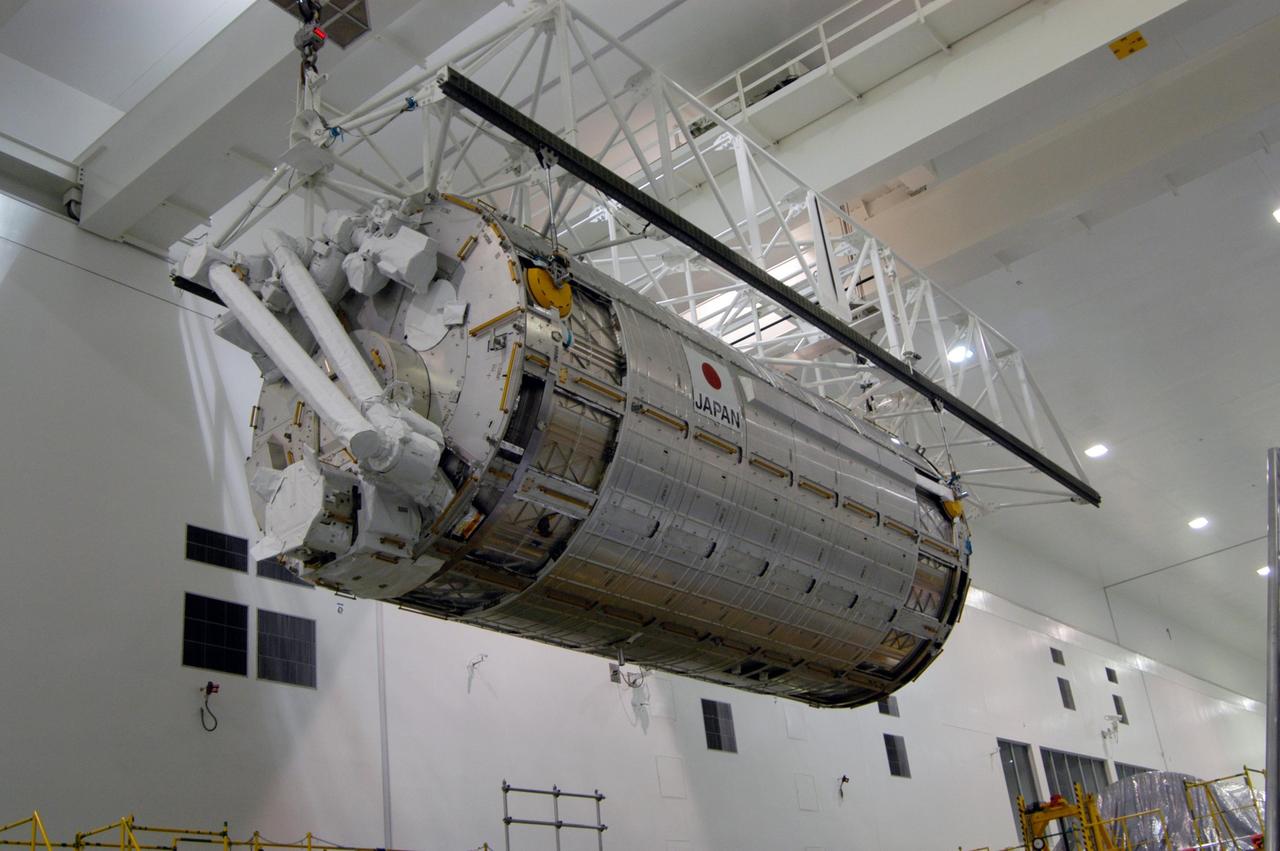 KENNEDY SPACE CENTER, FLA. -- In the Space Station Processing Facility at NASA's Kennedy Space Center, an overhead crane lifts and moves the Japanese Experiment Module, called Kibo, to a scale for weighing. Also known as the JEM-PM, the module is the primary payload for space shuttle Discovery's STS-124 mission, which is targeted for launch to the International Space Station on April 24. Photo credit: NASA/Jim Cain