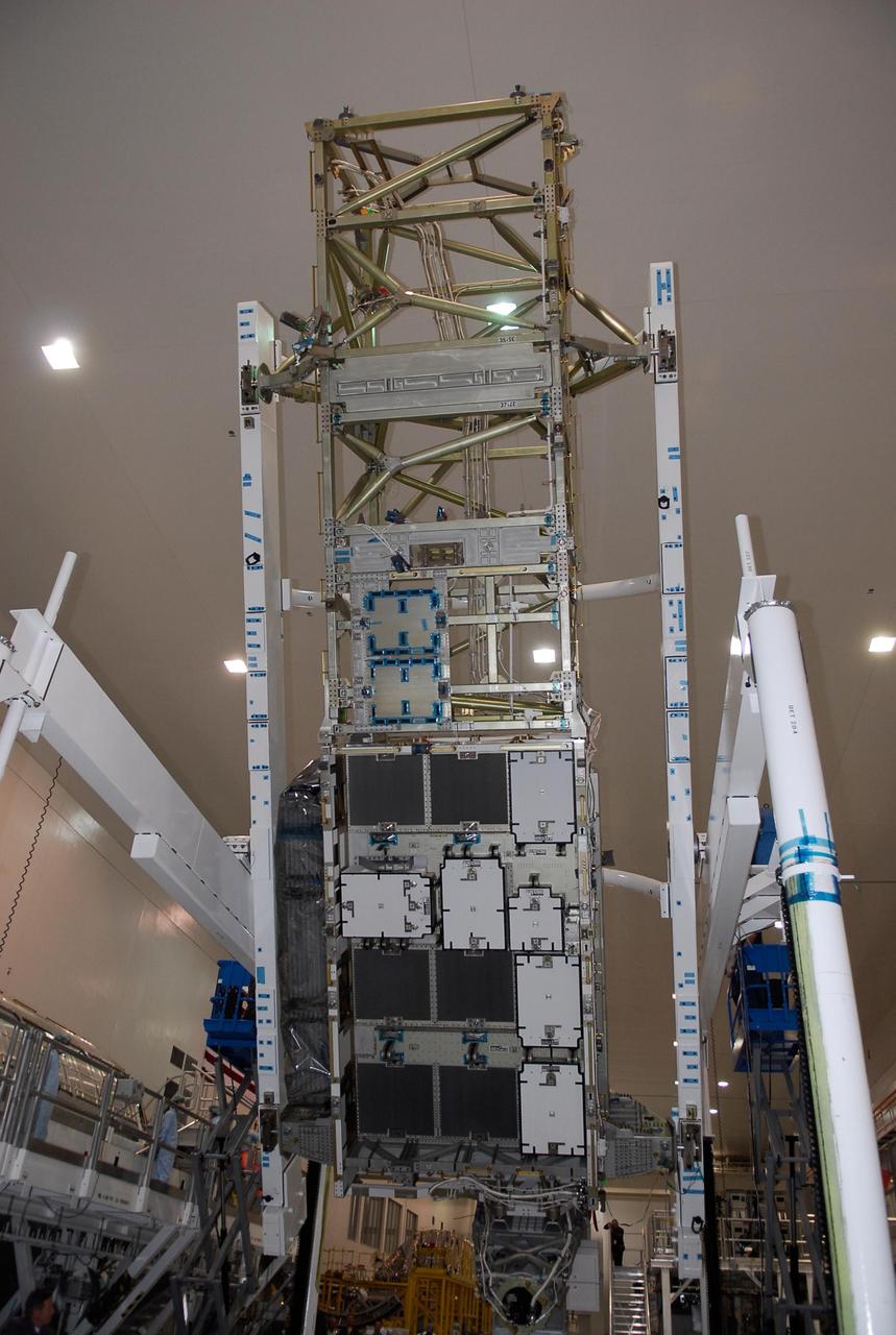 KENNEDY SPACE CENTER, FLA. -- In the Space Station Processing Facility at NASA's Kennedy Space Center, the starboard integrated truss, known as S6, is half way through its rotation. The truss is being rotated in order to remove and replace lower deck batteries. The final starboard truss in the assembly of the International Space Station, the S6 is scheduled to fly on the STS-119 space shuttle mission, whose launch date is not yet determined. Photo credit: NASA/Kim Shiflett