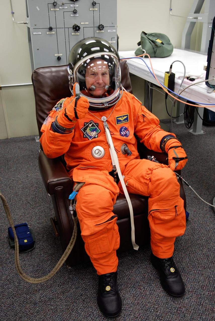 KENNEDY SPACE CENTER, FLA. -- Pilot Alan Poindexter is suited and ready for the launch of space shuttle Atlantis on the STS-122 mission. The launch, scheduled for 2:45 p.m. EST, will be the third attempt for Atlantis since December 2007 to carry the European Space Agency's Columbus laboratory to the International Space Station. During the 11-day mission, the crew's prime objective is to attach the laboratory to the Harmony module, adding to the station's size and capabilities. Photo credit: NASA/Kim Shiflett