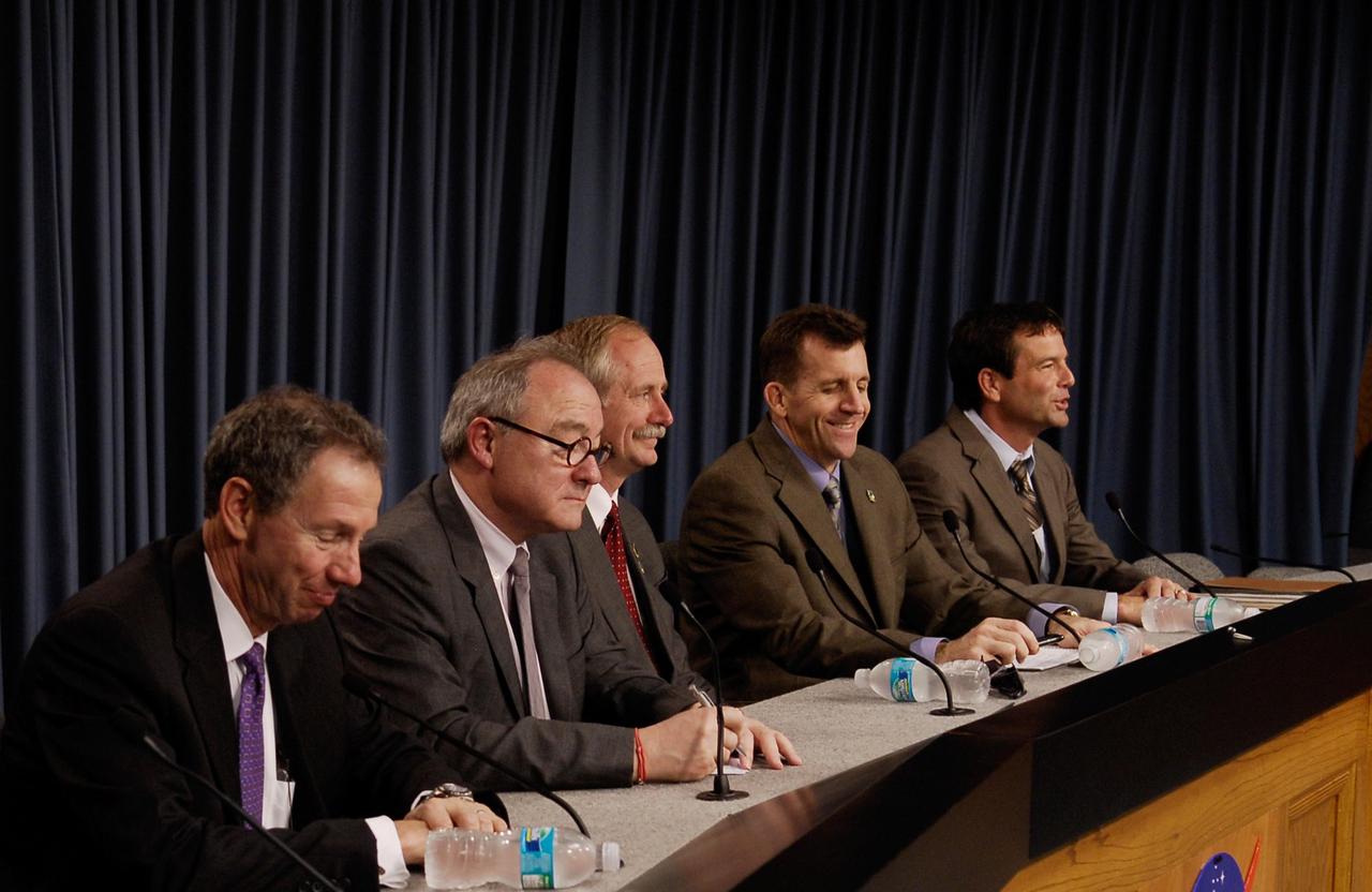 KENNEDY SPACE CENTER, FLA. -- Following the successful launch of space shuttle Atlantis on mission STS-122, NASA VIPs appear at a news conference to give their views about the launch and mission. From left are NASA Administrator Michael Griffin, European Space Agency Director General Jean-Jacques Dordain, Associate Administrator for Space Operations Bill Gerstenmaier, Director of Mission Launch Integration LeRoy Cain and STS-122 Launch Director Doug Lyons. During the 11-day mission, the crew's prime objective is to attach the Columbus laboratory to the Harmony module, adding to the station's size and capabilities. Photo credit: NASA/Kim Shiflett