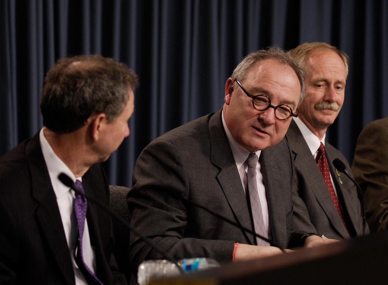 KENNEDY SPACE CENTER, FLA. --  Following the successful launch of space shuttle Atlantis on mission STS-122, European Space Agency Director General Jean-Jacques Dordain (center) thanks NASA and Administrator Michael Griffin (left) for the launch of the ESA Columbus laboratory that ensures ESA is a capable partner in the International Space Station. At right is Associate Administrator for Space Operations Bill Gerstenmaier.  During the 11-day mission, the crew's prime objective is to attach the Columbus laboratory to the Harmony module, adding to the station's size and capabilities.   Photo credit: NASA/Kim Shiflett