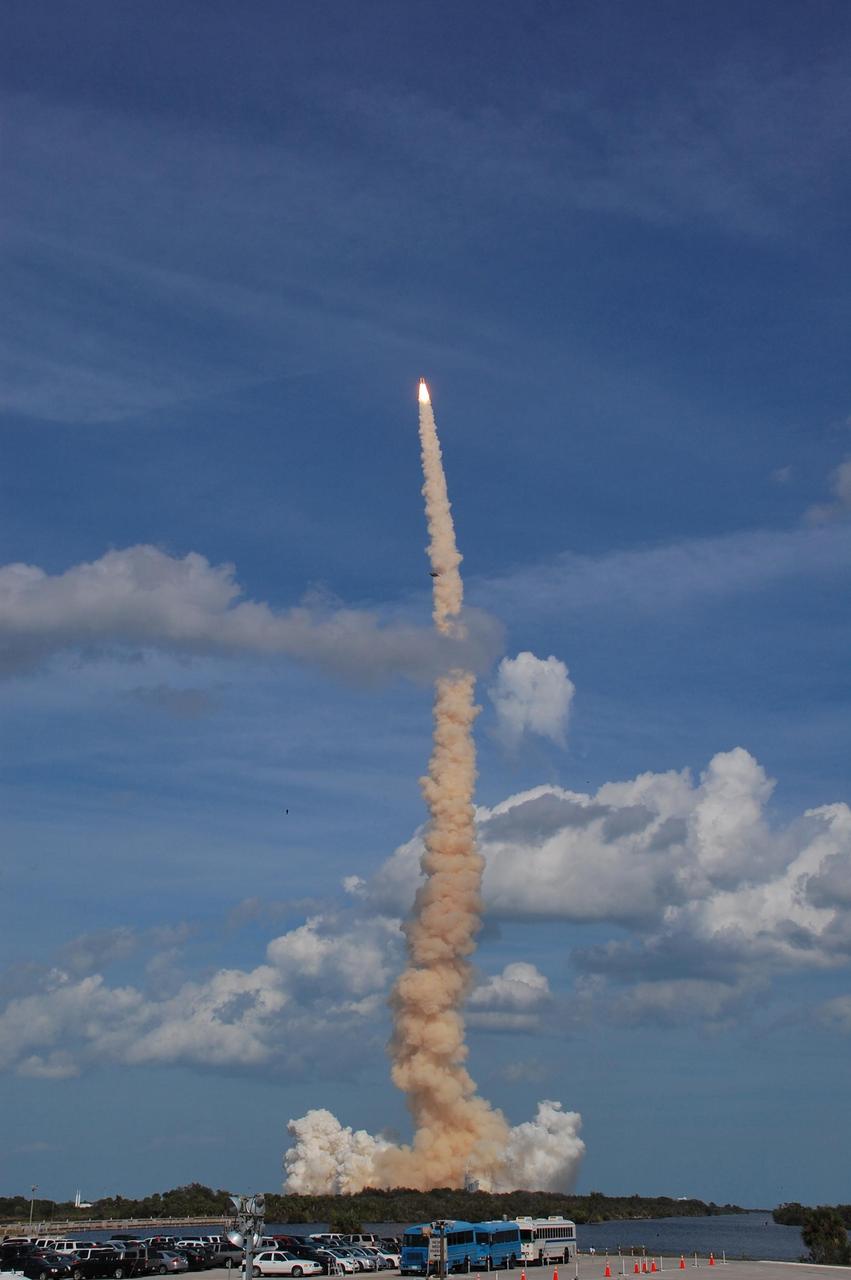 KENNEDY SPACE CENTER, FLA. --  Through a partly cloudy sky, space shuttle Atlantis hurtles into the sky, atop a column of fire and smoke, on the STS-122 mission.  Liftoff was on time at 2:45 p.m. EST.   This is the third launch attempt for Atlantis since December 2007 to carry the European Space Agency's Columbus laboratory to the International Space Station.  During the 11-day mission, the crew's prime objective is to attach the laboratory to the Harmony module, adding to the station's size and capabilities.   Photo credit: NASA/Fletch Hildreth