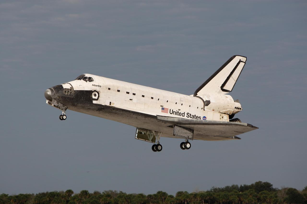 KENNEDY SPACE CENTER, FLA. -- With wheels down, space shuttle Atlantis approaches a landing on Runway 15 of the Shuttle Landing Facility at NASA's Kennedy Space Center after a nearly 5.3 million mile round trip to the International Space Station. The shuttle landed on orbit 202 to complete the 13-day STS-122 mission. Main gear touchdown was 9:07:10 a.m. Nose gear touchdown was 9:07:20 a.m. Wheel stop was at 9:08:08 a.m. Mission elapsed time was 12 days, 18 hours, 21 minutes and 44 seconds. During the mission, Atlantis' crew installed the new Columbus laboratory, leaving a larger space station and one with increased science capabilities. The Columbus Research Module adds nearly 1,000 cubic feet of habitable volume and affords room for 10 experiment racks, each an independent science lab. Photo courtesy of Chuck Luzier