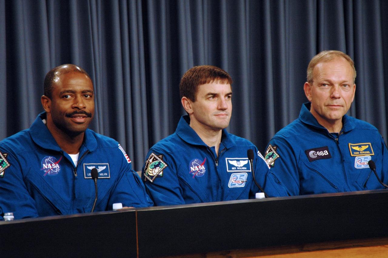KENNEDY SPACE CENTER, FLA. -- The STS-122 crew discusses its mission at a post-landing conference. Seen here, from left, are Mission Specialists Leland Melvin, Rex Walheim and Hans Schlegel, who represents the European Space Agency. After a round trip of nearly 5.3 million miles, space shuttle Atlantis and crew returned to Earth with a landing at 9:07 a.m. EST on Runway 15 at NASA's Kennedy Space Center. Photo credit: NASA/Jack Pfaller