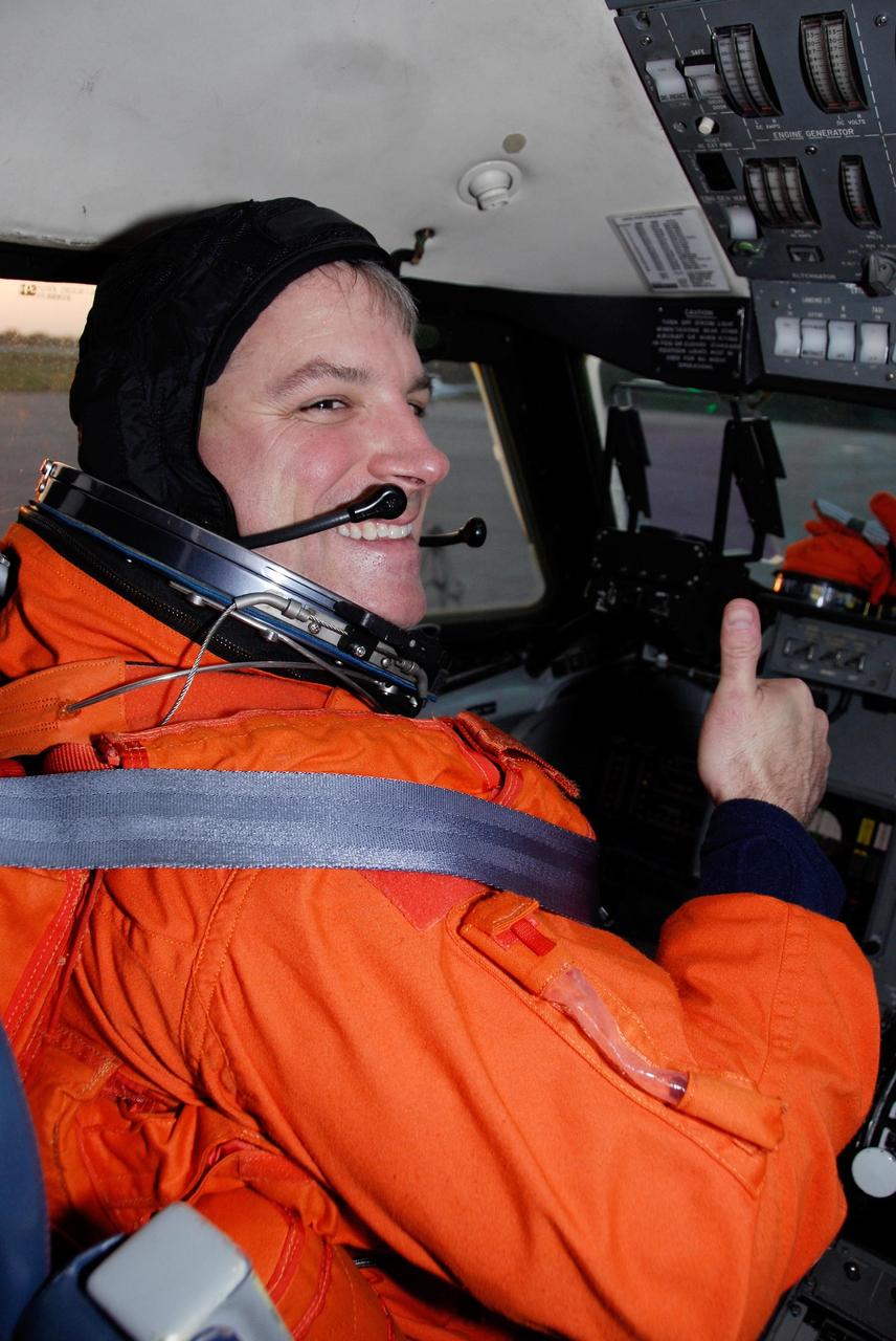 KENNEDY SPACE CENTER, FLA. -- At NASA Kennedy Space Center's Shuttle Landing Facility, STS-123 Pilot Gregory H. Johnson prepares for takeoff in a Shuttle Training Aircraft, or STA, to practice space shuttle landings. The STA is a Grumman American Aviation-built Gulf Stream II jet that was modified to simulate an orbiter's cockpit, motion and visual cues, and handling qualities. In flight, the STA duplicates the orbiter's atmospheric descent trajectory from approximately 35,000 feet altitude to landing on a runway. Because the orbiter is unpowered during re-entry and landing, its high-speed glide must be perfectly executed the first time.  The crew for space shuttle Endeavour's STS-123 mission is at Kennedy for a full launch dress rehearsal, known as the terminal countdown demonstration test or TCDT.  The terminal countdown demonstration test provides astronauts and ground crews with an opportunity to participate in various simulated countdown activities, including equipment familiarization and emergency training. Endeavour is targeted to launch March 11 at 2:28 a.m. EDT on a 16-day mission to the International Space Station. On the mission, Endeavour and its crew will deliver the first section of the Japan Aerospace Exploration Agency's Kibo laboratory and the Canadian Space Agency's two-armed robotic system, Dextre. Photo credit: NASA/Kim Shiflett