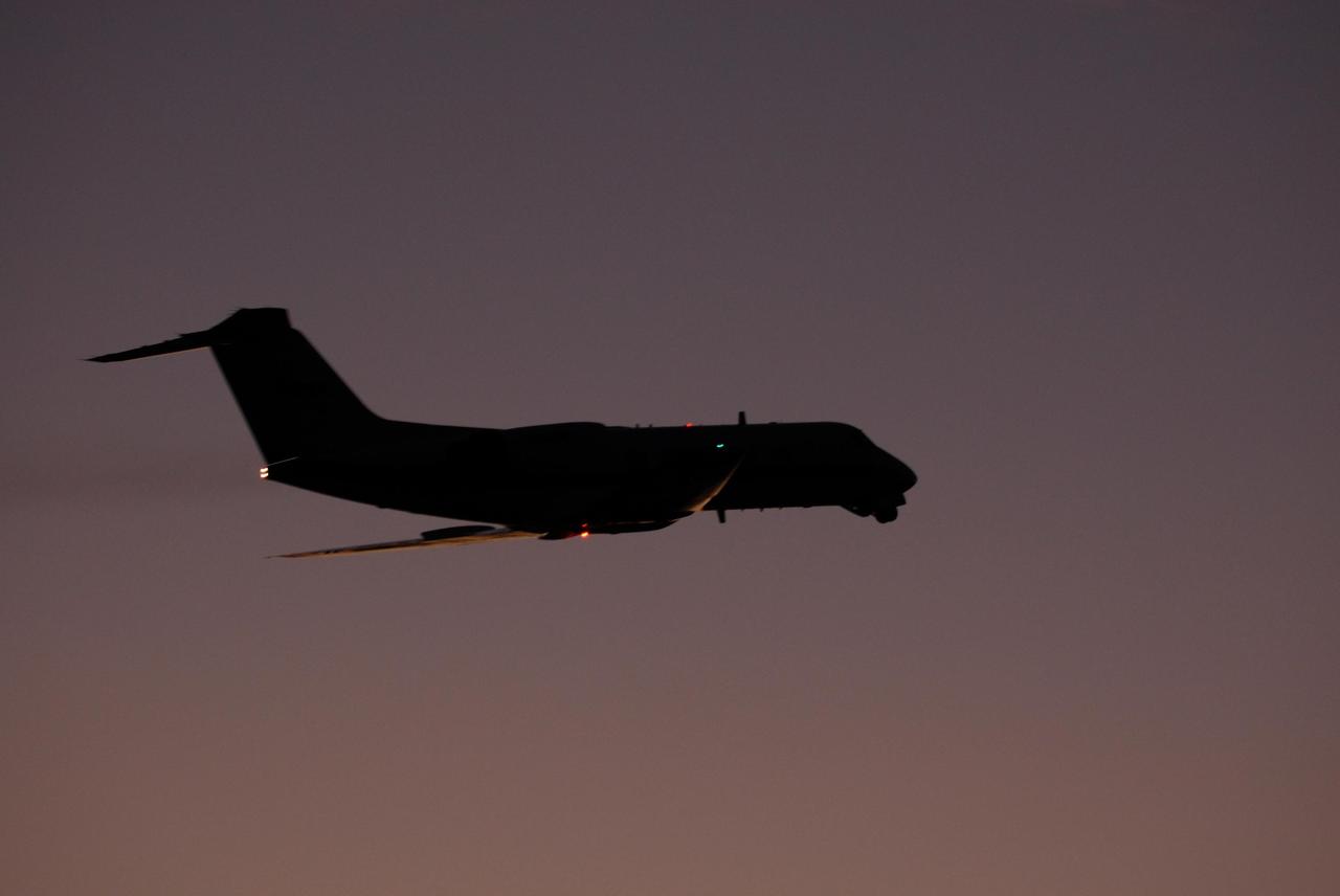 KENNEDY SPACE CENTER, FLA. -- At NASA Kennedy Space Center's Shuttle Landing Facility, a Shuttle Training Aircraft, or STA, takes flight for practice space shuttle landings.    The STA is a Grumman American Aviation-built Gulf Stream II jet that was modified to simulate an orbiter's cockpit, motion and visual cues, and handling qualities. In flight, the STA duplicates the orbiter's atmospheric descent trajectory from approximately 35,000 feet altitude to landing on a runway. Because the orbiter is unpowered during re-entry and landing, its high-speed glide must be perfectly executed the first time.  The crew for space shuttle Endeavour's STS-123 mission is at Kennedy for a full launch dress rehearsal, known as the terminal countdown demonstration test or TCDT.  The terminal countdown demonstration test provides astronauts and ground crews with an opportunity to participate in various simulated countdown activities, including equipment familiarization and emergency training. Endeavour is targeted to launch March 11 at 2:28 a.m. EDT on a 16-day mission to the International Space Station. On the mission, Endeavour and its crew will deliver the first section of the Japan Aerospace Exploration Agency's Kibo laboratory and the Canadian Space Agency's two-armed robotic system, Dextre. Photo credit: NASA/Kim Shiflett