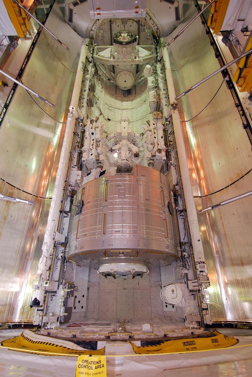 KENNEDY SPACE CENTER, FLA. --   On NASA Kennedy Space Center's Launch Pad 39A, space shuttle Endeavour's payload bay is ready for closure of the doors for launch.  Seen at the bottom is the first section of the Japan Aerospace Exploration Agency's Kibo laboratory, the Experiment Logistics Module Pressurized Section, or ELM-PS.  At the top is the orbiter docking system.  Endeavour is targeted to launch March 11 at 2:28 a.m. EDT on the 16-day STS-123 mission to the International Space Station. Endeavour and its crew will deliver the ELM-PS and the Canadian Space Agency's two-armed robotic system, Dextre.   Photo credit: NASA/Dimitri Gerondidakis
