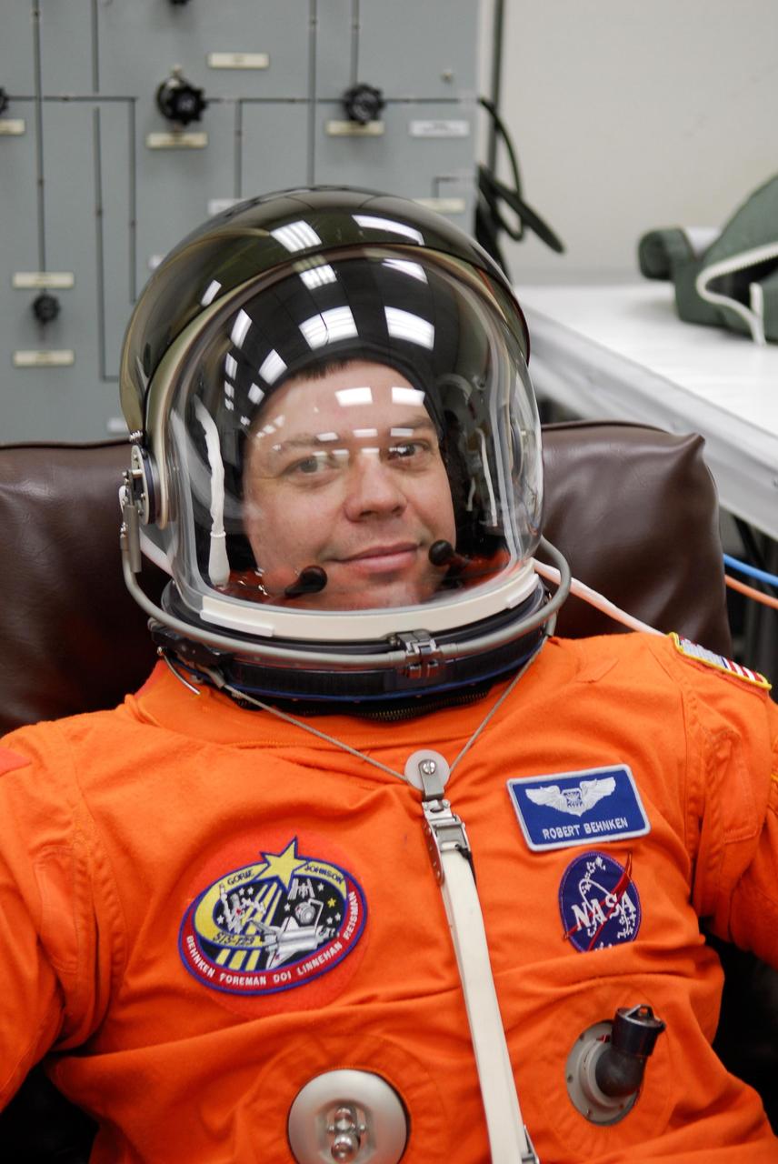 KENNEDY SPACE CENTER, FLA. --   STS-123 Mission Specialist Robert L. Behnken is fully suited for the launch dress rehearsal, culmination of the terminal countdown demonstration test, or TCDT. The TCDT provides astronauts and ground crews with an opportunity to participate in various simulated countdown activities, including equipment familiarization and emergency training. Space shuttle Endeavour is targeted to launch March 11 at 2:28 a.m. EDT on the 16-day STS-123 mission to the International Space Station.  Endeavour and its crew will deliver the first section of the Japan Aerospace Exploration Agency's Kibo laboratory and the Canadian Space Agency's two-armed robotic system, Dextre.   Photo credit: NASA/Kim Shiflett