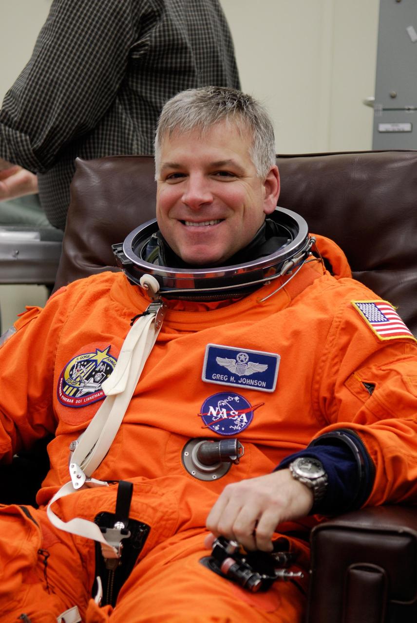 KENNEDY SPACE CENTER, FLA. --  STS-123 Pilot Gregory H. Johnson is ready to finish suiting up for the launch dress rehearsal, culmination of the terminal countdown demonstration test, or TCDT.  The TCDT provides astronauts and ground crews with an opportunity to participate in various simulated countdown activities, including equipment familiarization and emergency training. Space shuttle Endeavour is targeted to launch March 11 at 2:28 a.m. EDT on the 16-day STS-123 mission to the International Space Station.  Endeavour and its crew will deliver the first section of the Japan Aerospace Exploration Agency's Kibo laboratory and the Canadian Space Agency's two-armed robotic system, Dextre.   Photo credit: NASA/Kim Shiflett