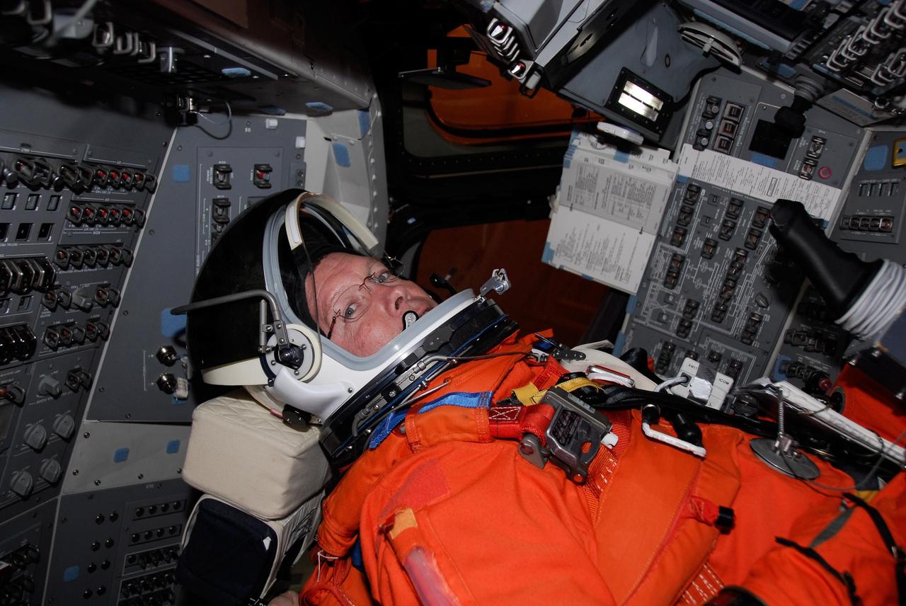 KENNEDY SPACE CENTER, FLA. -- Inside space shuttle Endeavour, STS-123 Commander Dominic Gorie takes part in the simulated launch countdown, which is the culmination of the terminal countdown demonstration test, or TCDT. The TCDT provides astronauts and ground crews with an opportunity to participate in various countdown activities, including equipment familiarization and emergency egress training. Endeavour is targeted to launch at 2:28 a.m. EDT March 11 on the 16-day STS-123 mission to the International Space Station. Endeavour and its crew will deliver the first section of the Japan Aerospace Exploration Agency's Kibo laboratory and the Canadian Space Agency's two-armed robotic system, Dextre. Photo credit: NASA/Kim Shiflett