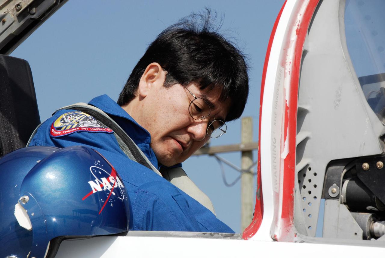 KENNEDY SPACE CENTER, FLA. -- At the NASA Kennedy Space Center's Shuttle Landing Facility, STS-123 Mission Specialist Takao Doi waits in the aircraft that will return him to Houston. He and the other STS-123 crew members took part in a terminal countdown demonstration test, or TCDT, in preparation for the launch of space shuttle Endeavour scheduled on March 11. Doi represents the Japan Aerospace Exploration Agency. The TCDT enables astronauts and ground crews to participate in various countdown activities, including equipment familiarization and emergency egress training. On the STS-123 mission, Endeavour and its crew will deliver the first section of the Japan Aerospace Exploration Agency's Kibo laboratory and the Canadian Space Agency's two-armed robotic system, Dextre Photo credit: NASA/Kim Shiflett